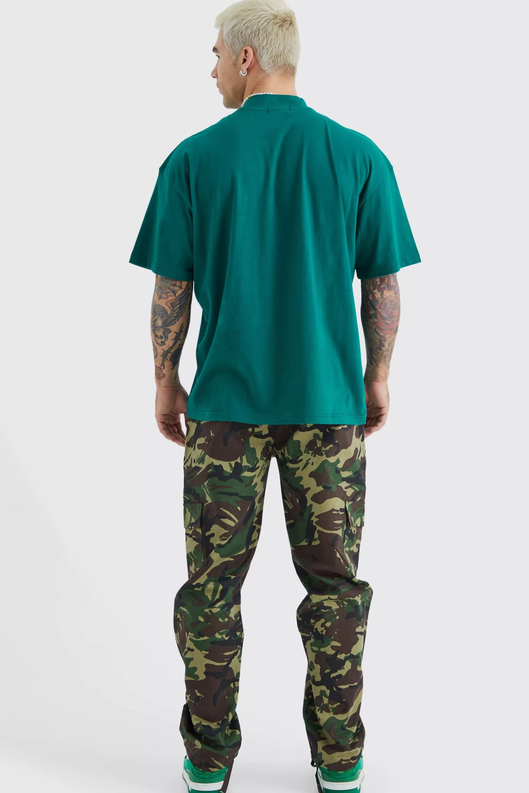boohooMAN Straight Leg Tie Hem Camo Trouser | UK