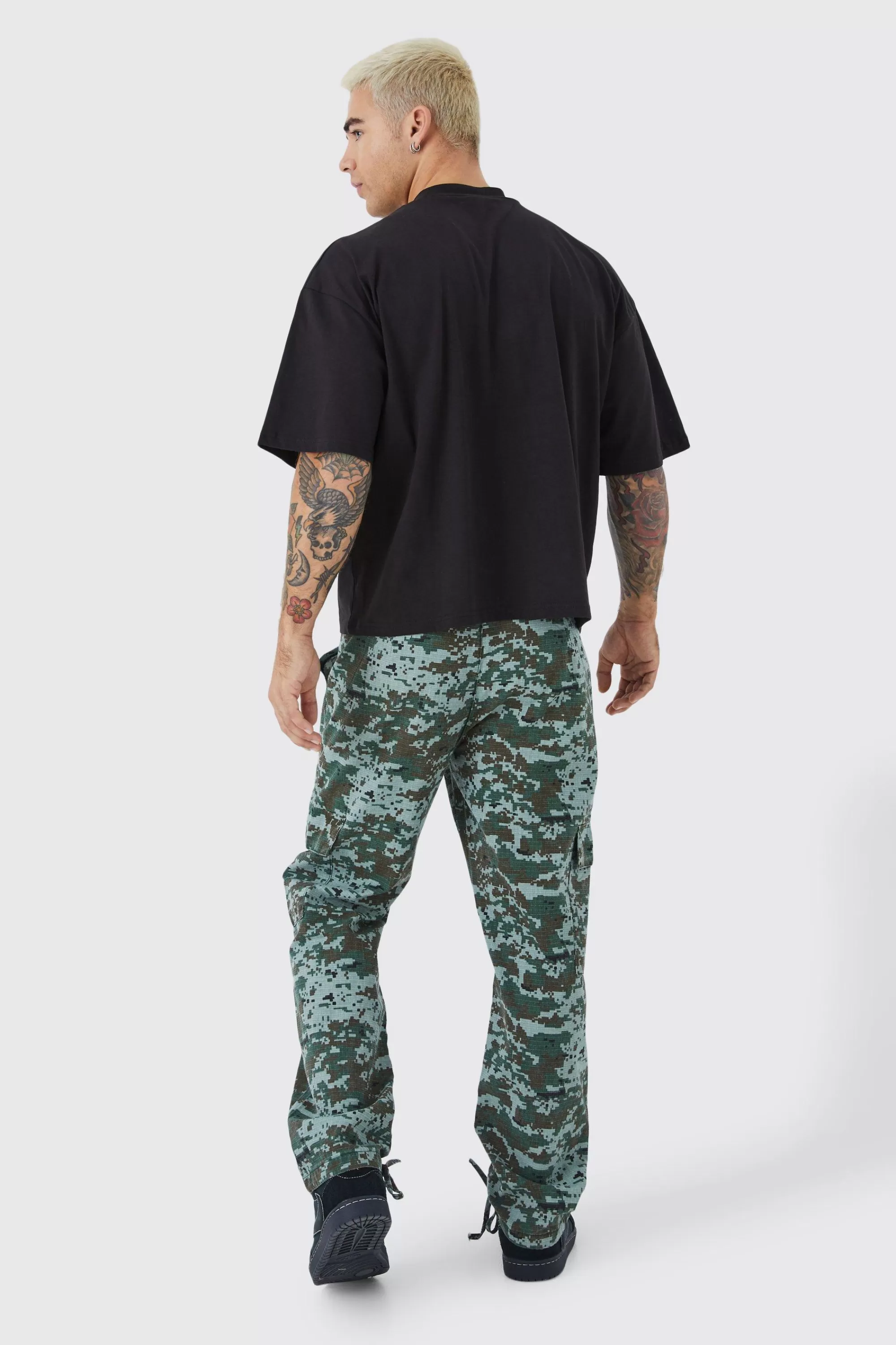 boohooMAN Straight Leg Tie Hem Camo Trouser | UK