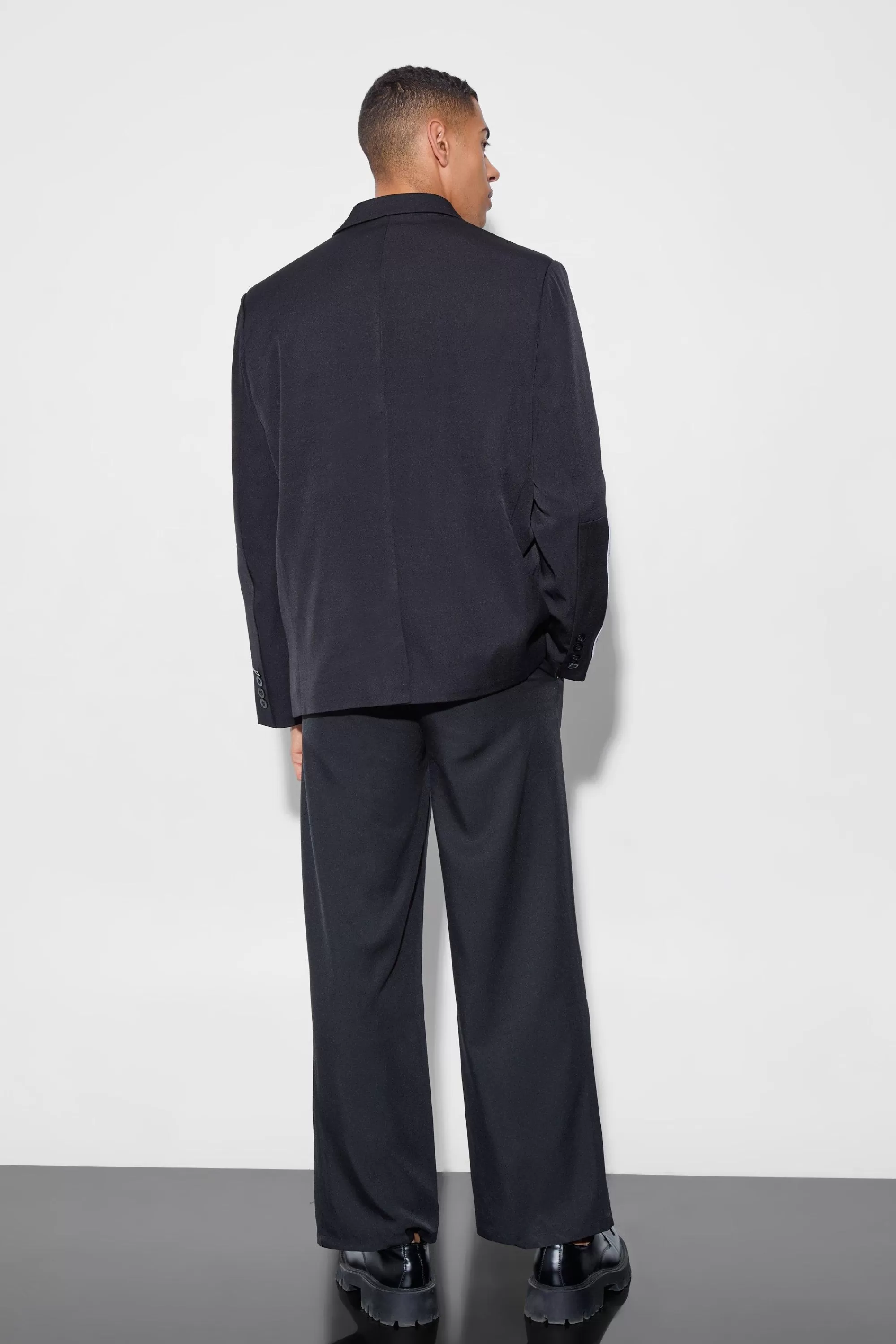 boohooMAN Tailored Pleat Front Wide Leg Trousers | UK