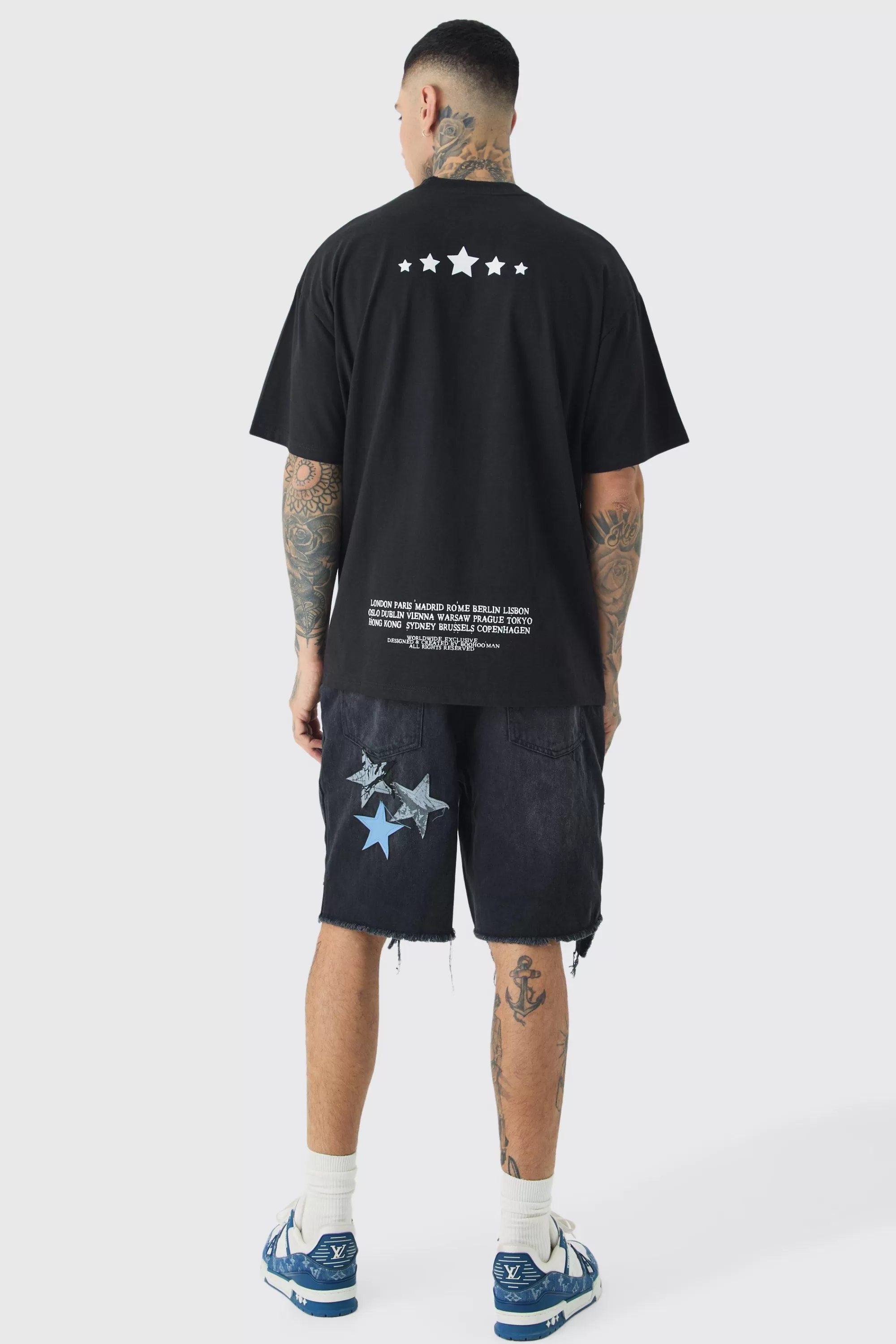 boohooMAN Tall Applique Raw Hem Denim Shorts | UK