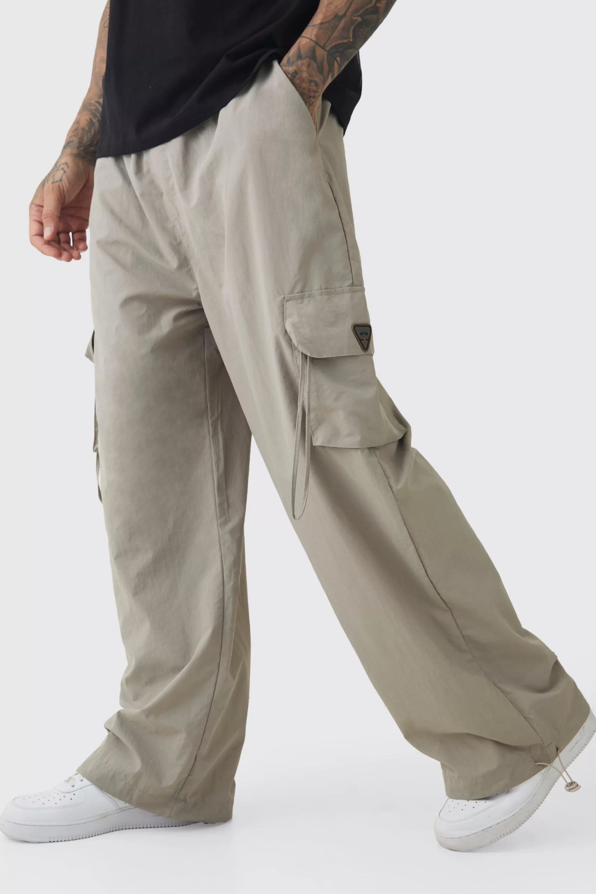 boohooMAN Tall Crinkle Nylon Cargo Parachute Trousers In | UK