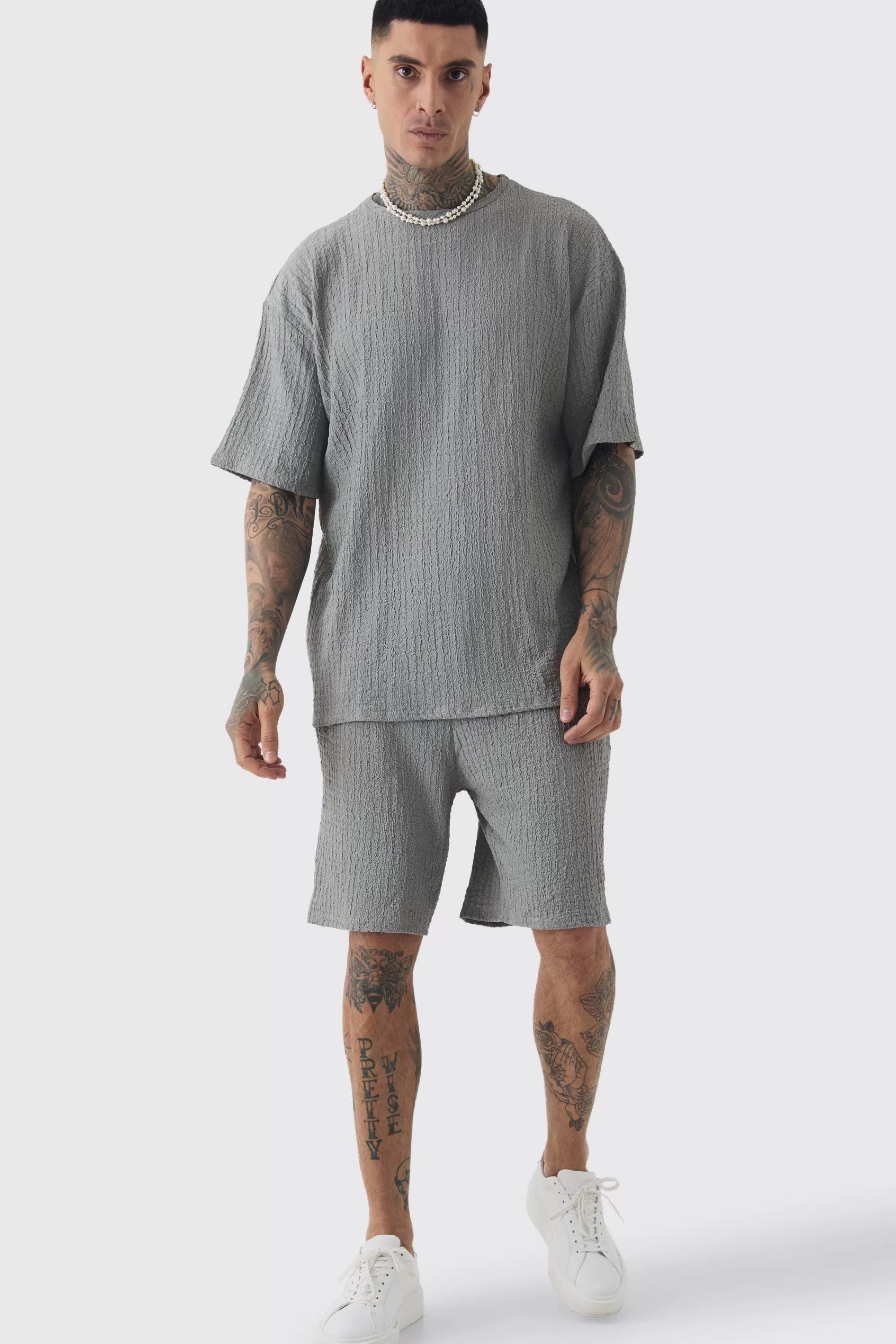 boohooMAN Tall Crinkle Textured T-Shirt & Short Set | UK