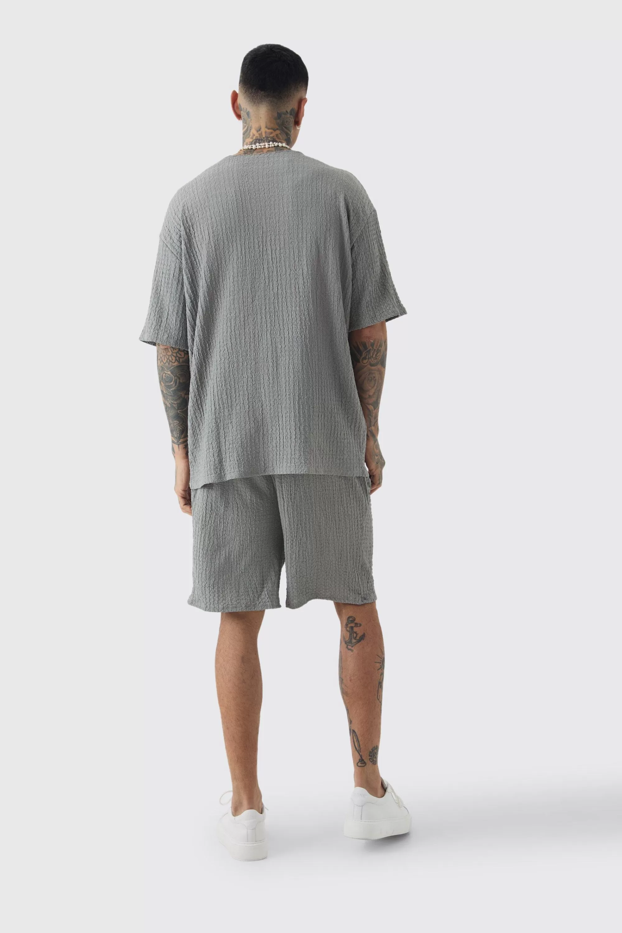boohooMAN Tall Crinkle Textured T-Shirt & Short Set | UK