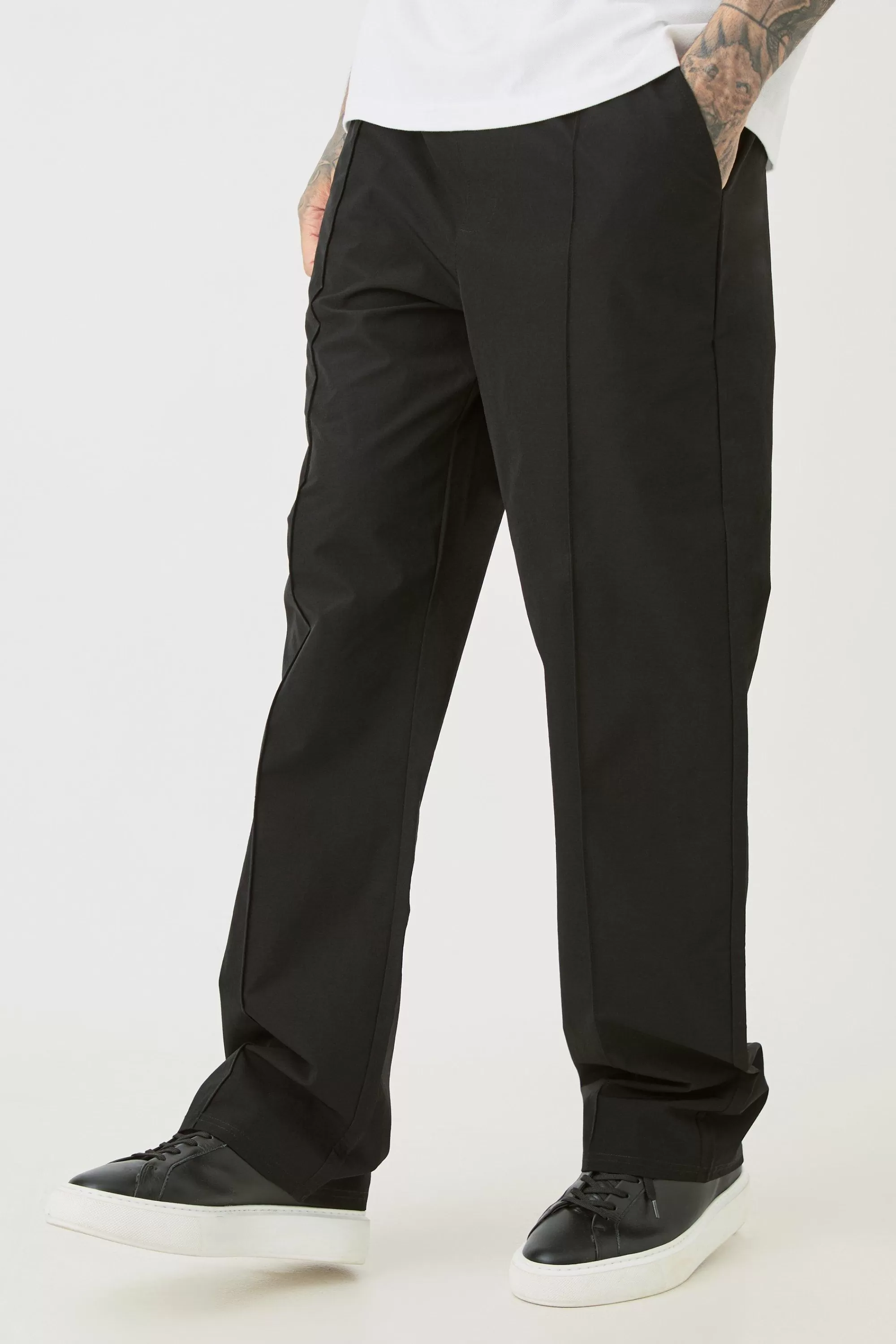 boohooMAN Tall Elasticated Lightweight Technical Stretch Relaxed Fit Pintuck Trousers | UK