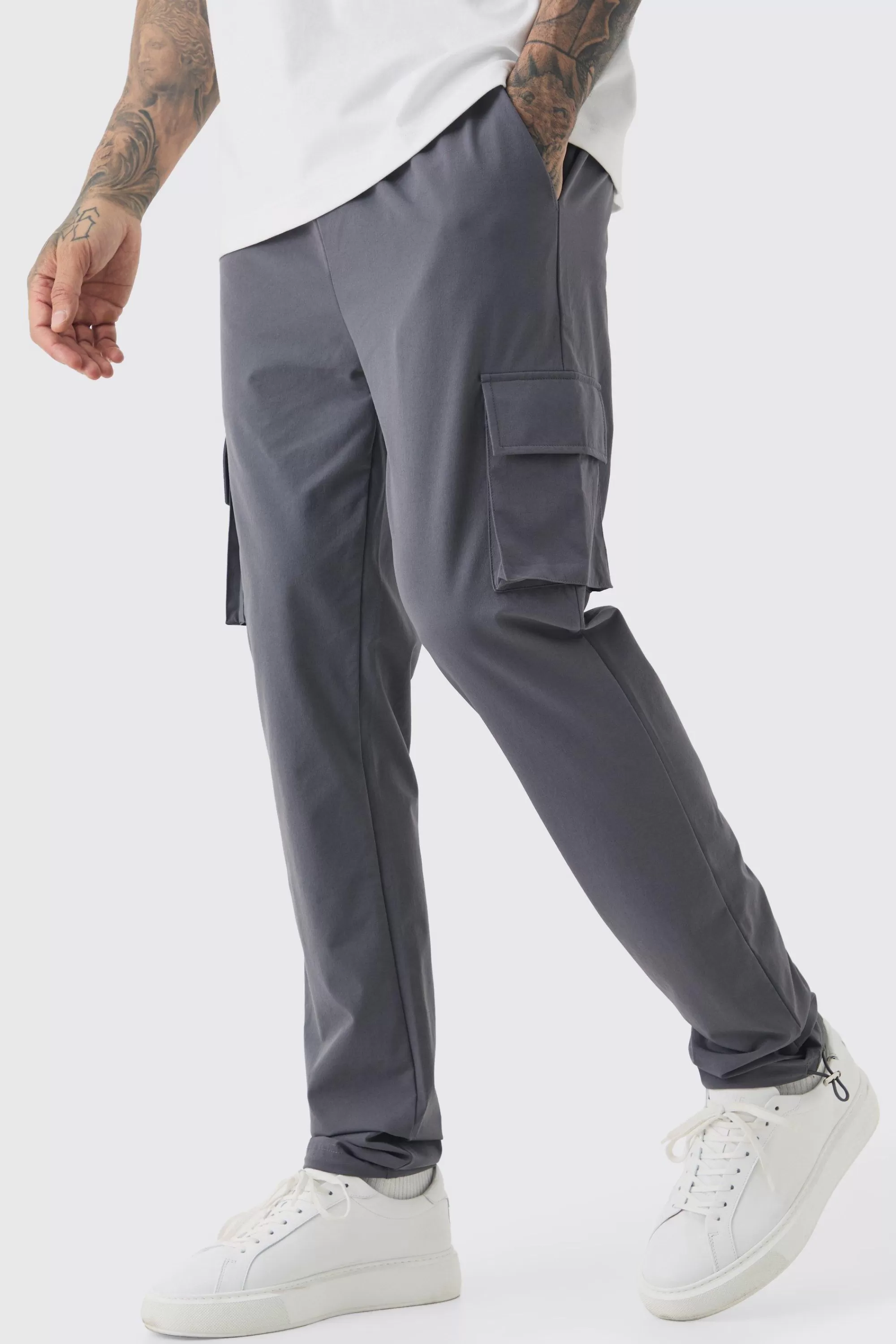 boohooMAN Tall Elasticated Lightweight Technical Stretch Skinny Cargo Trouser | UK