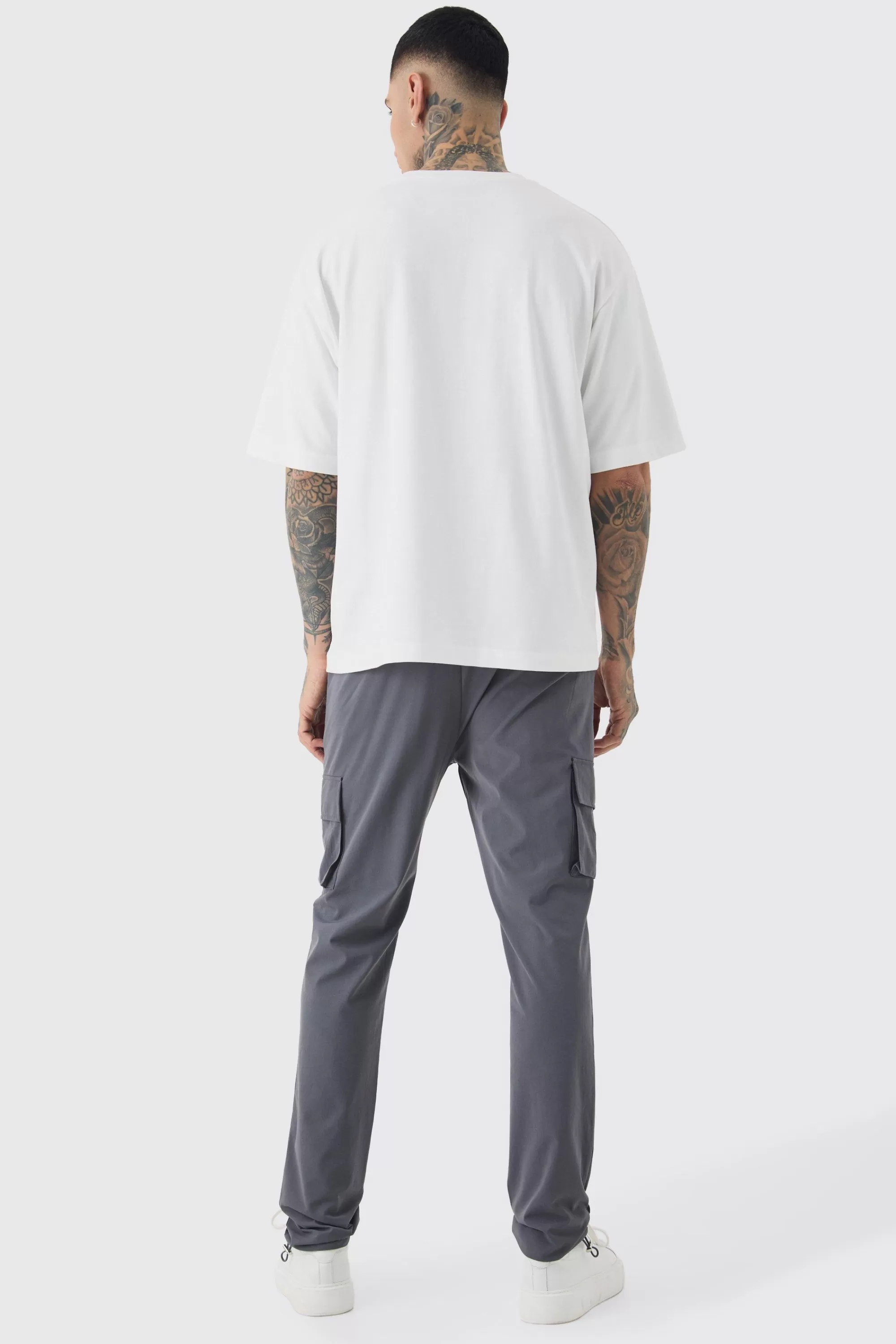 boohooMAN Tall Elasticated Lightweight Technical Stretch Skinny Cargo Trouser | UK