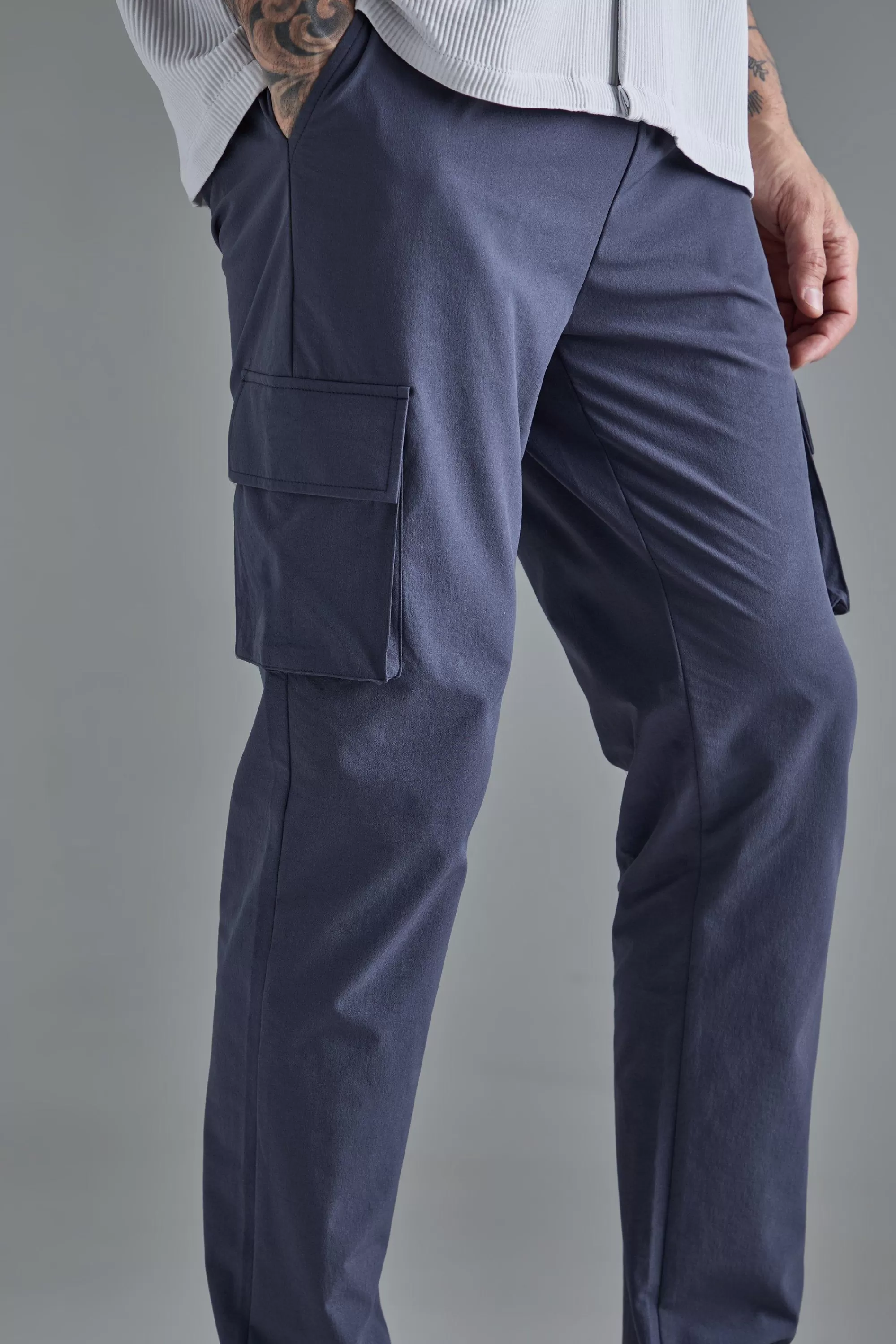 boohooMAN Tall Elasticated Lightweight Technical Stretch Skinny Cargo Trouser | UK