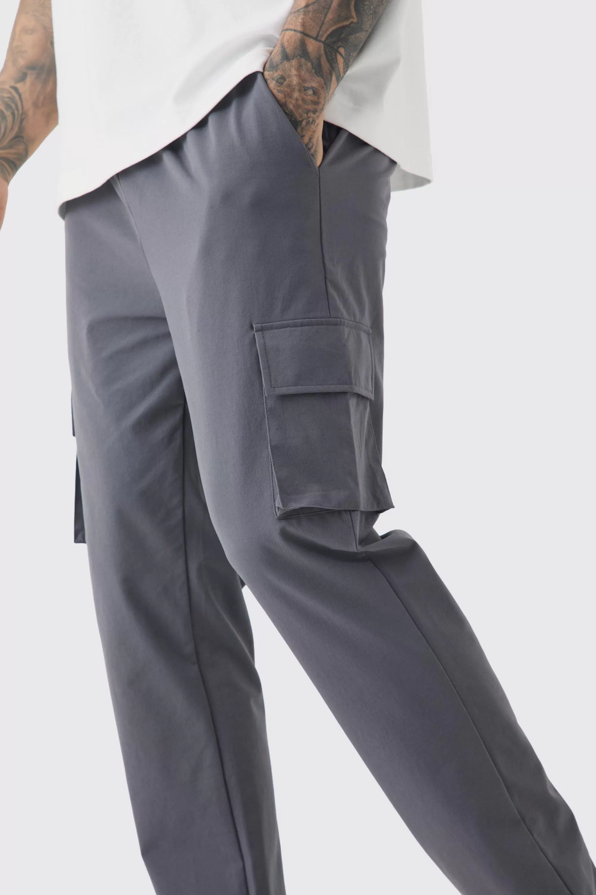 boohooMAN Tall Elasticated Lightweight Technical Stretch Skinny Cargo Trouser | UK
