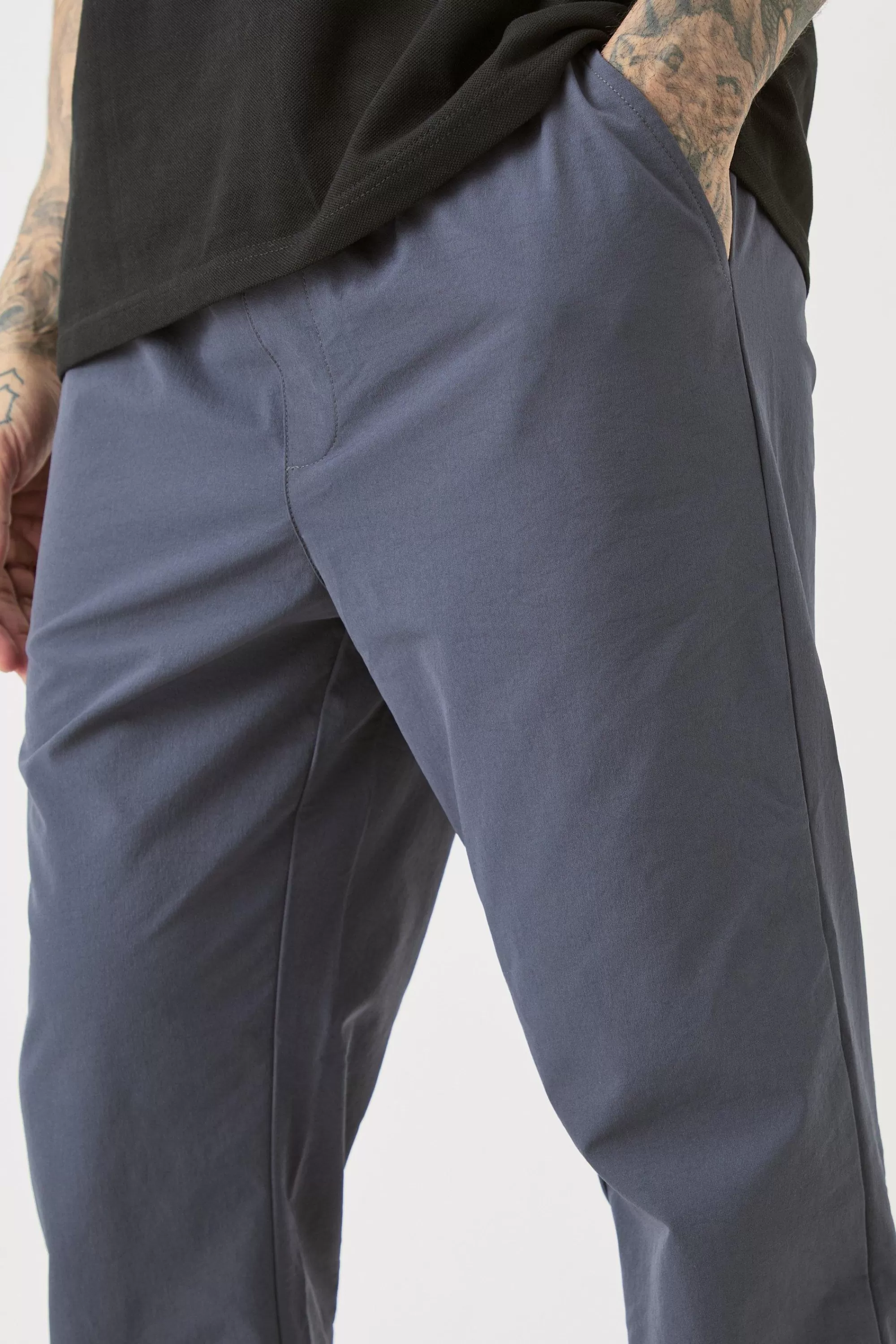 boohooMAN Tall Elasticated Lightweight Technical Stretch Slim Fit Trousers | UK