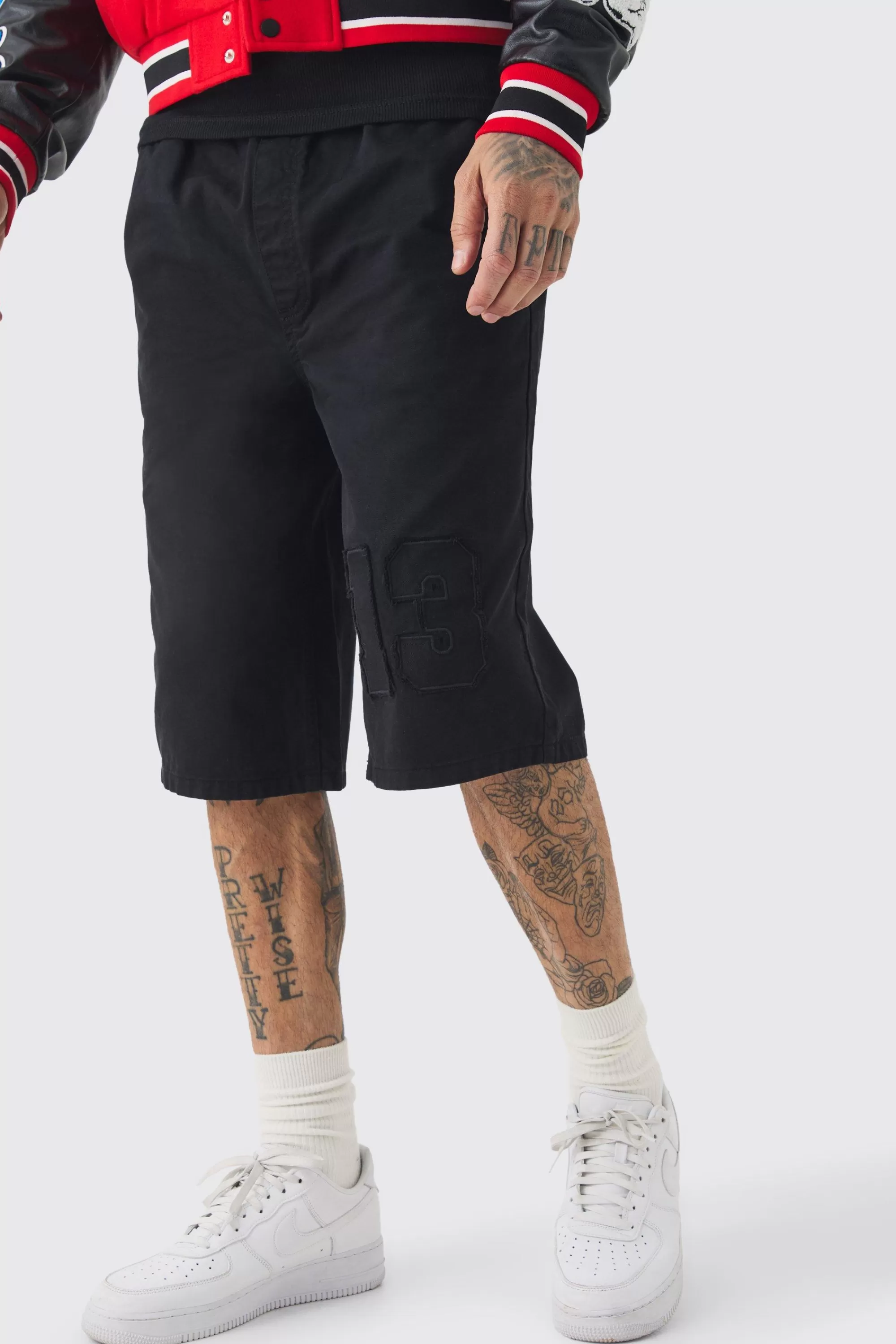 boohooMAN Tall Elasticated Waist Applique Jorts | UK