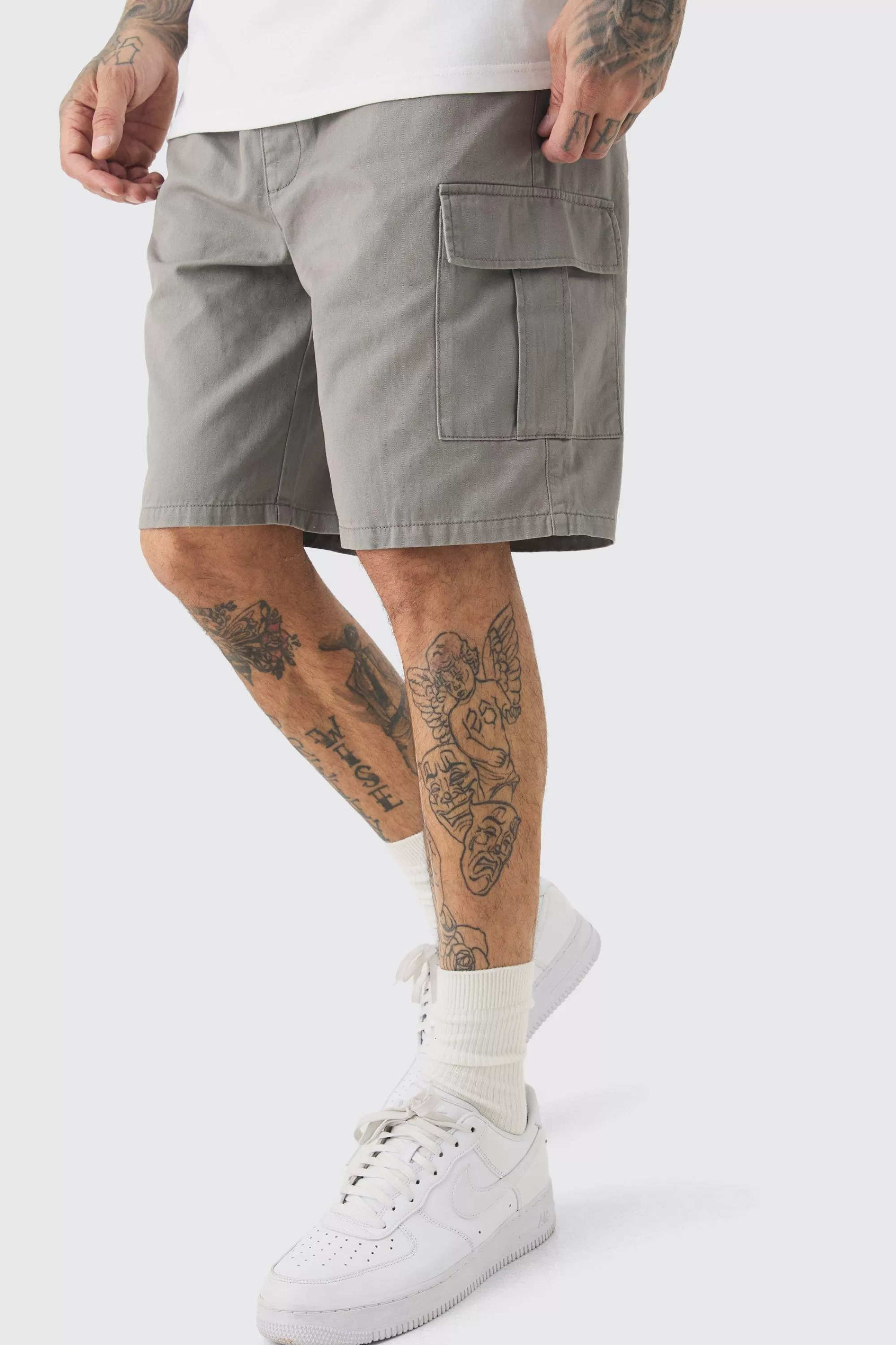 boohooMAN Tall Elasticated Waist Relaxed Fit Cargo Shorts | UK