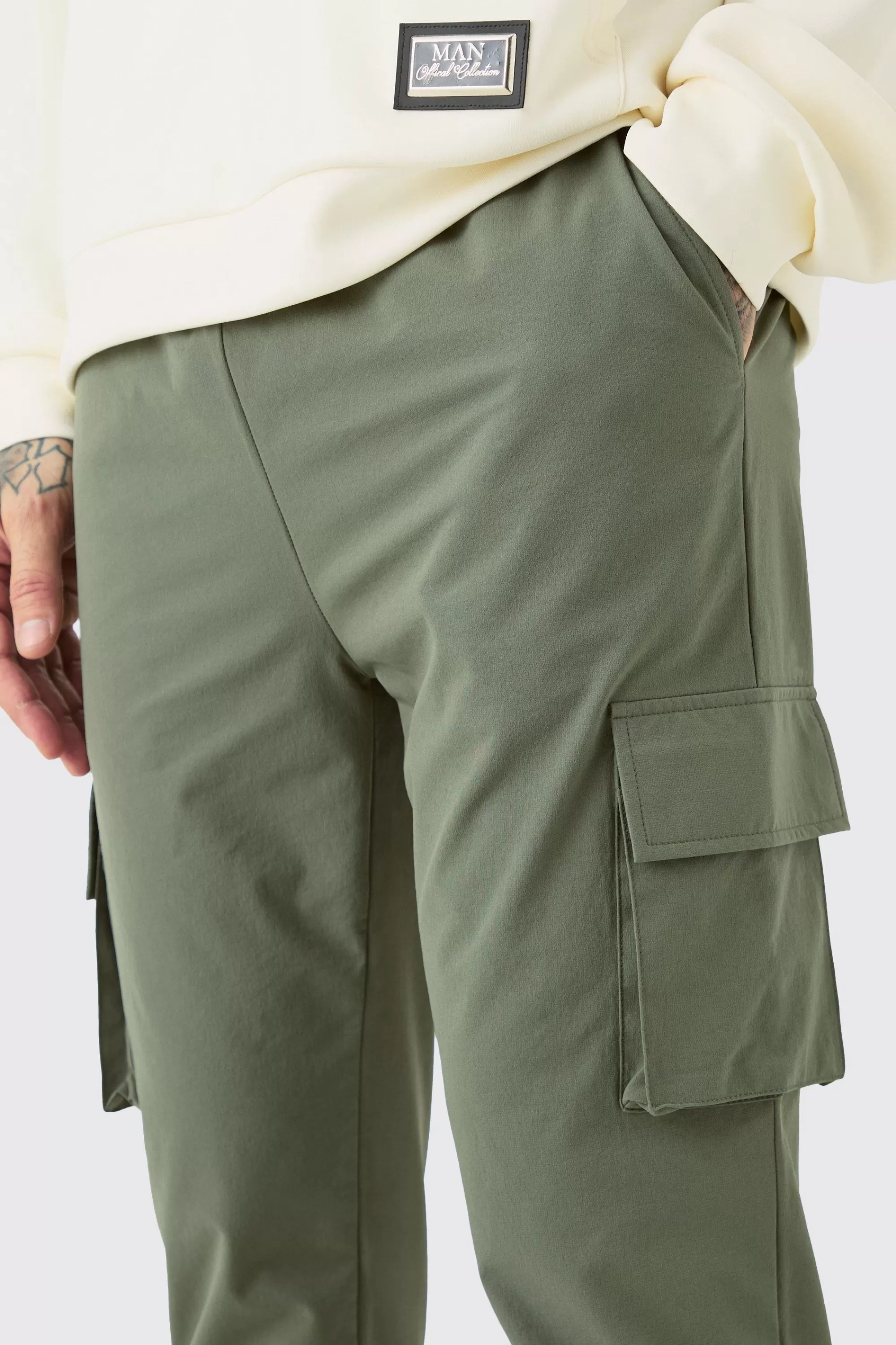 boohooMAN Tall Elasticated Waist Lightweight Stretch Skinny Cargo Trouser | UK