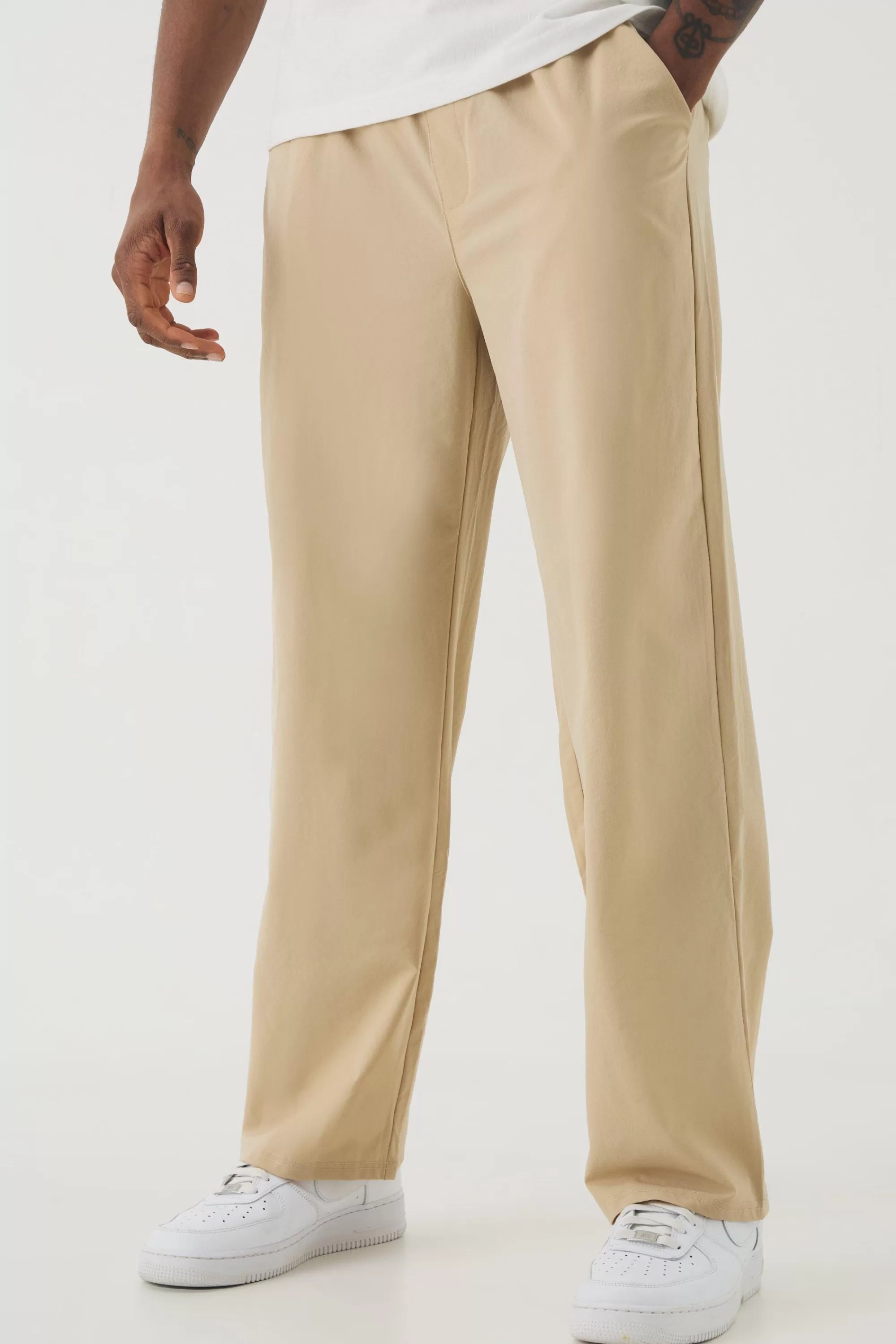 boohooMAN Tall Elasticated Waist Lightweight Technical Stretch Relaxed Cropped Trouser | UK