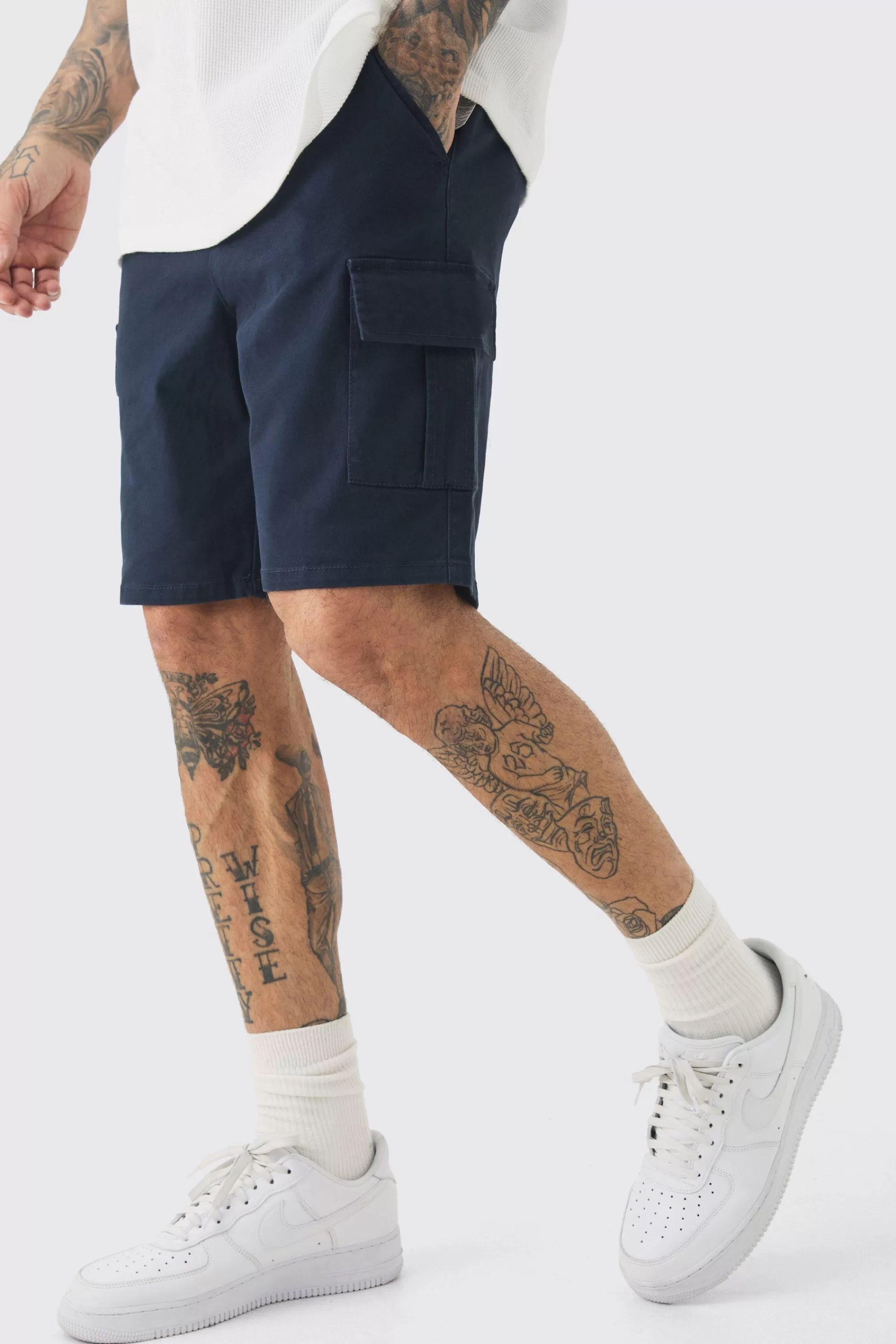 boohooMAN Tall Elasticated Waist Skinny Fit Cargo Shorts | UK