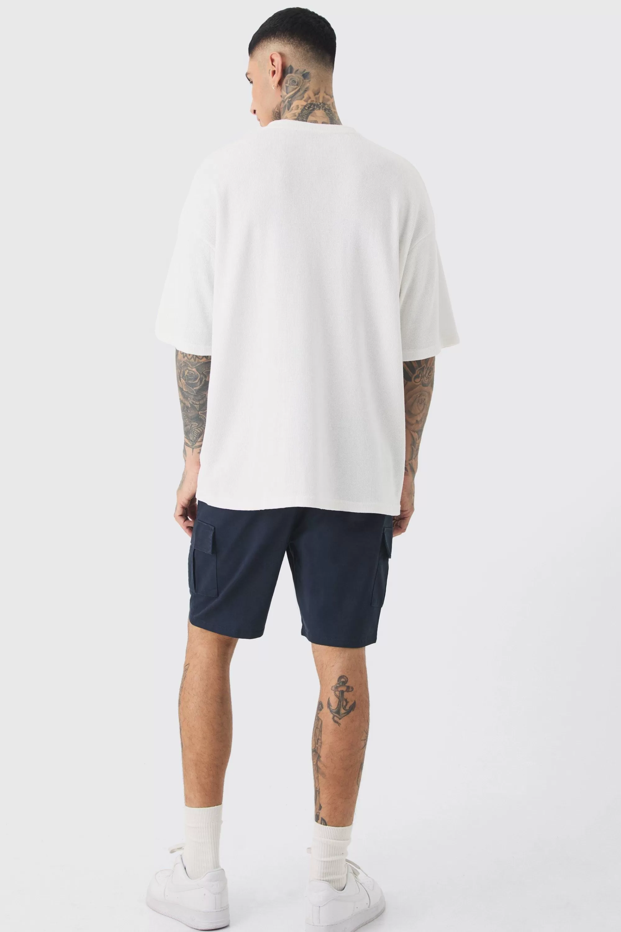 boohooMAN Tall Elasticated Waist Skinny Fit Cargo Shorts | UK