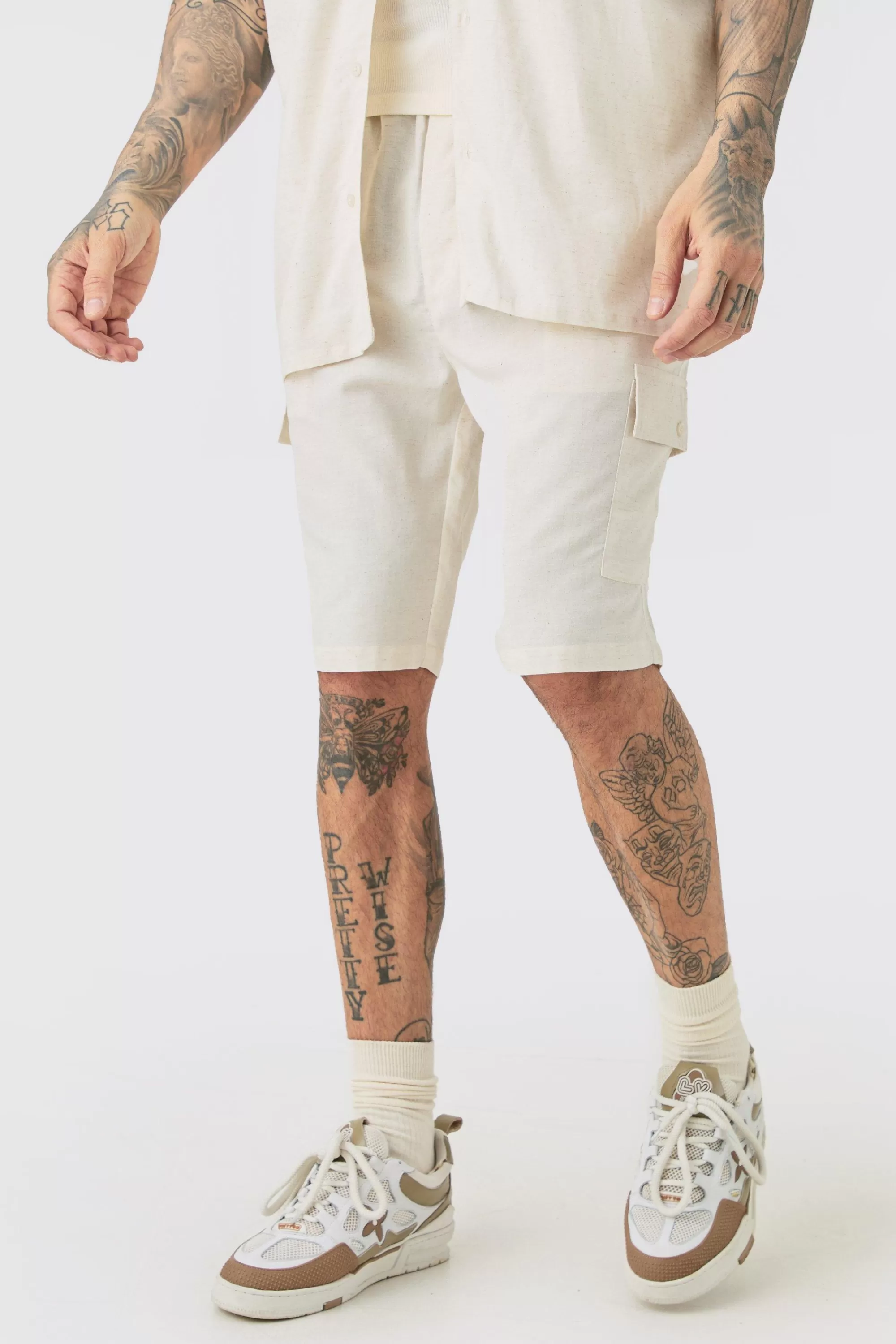 boohooMAN Tall Elasticated Waist Relaxed Linen Cargo Shorts In | UK