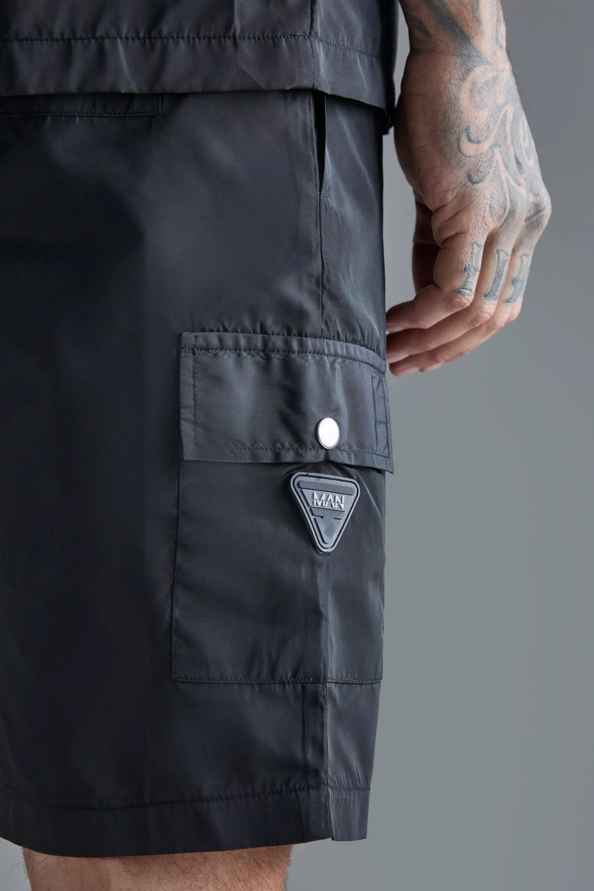 boohooMAN Tall Elasticated Waist Relaxed Nylon Man Cargo Short | UK