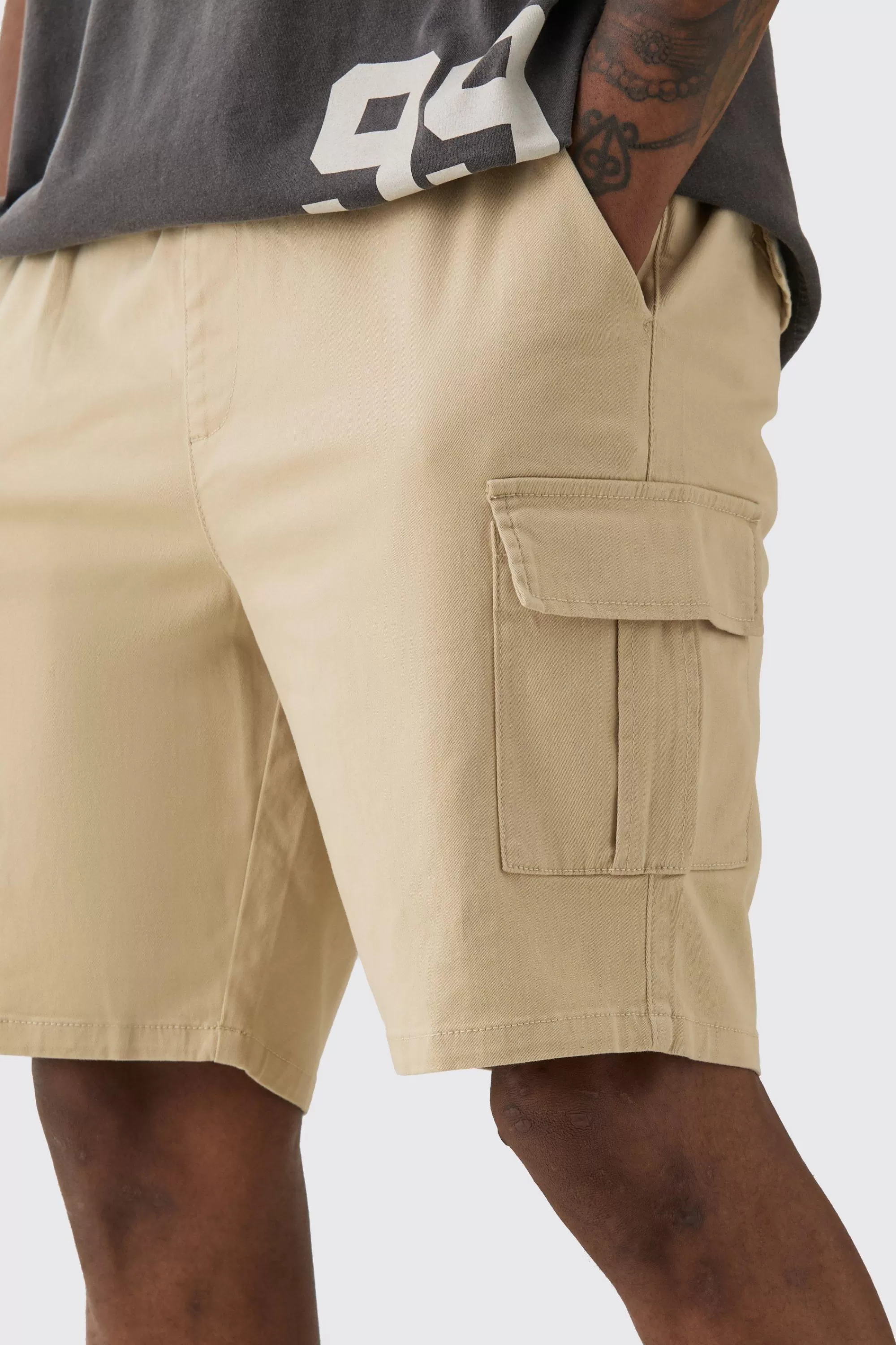 boohooMAN Tall Elasticated Waist Slim Fit Cargo Shorts | UK