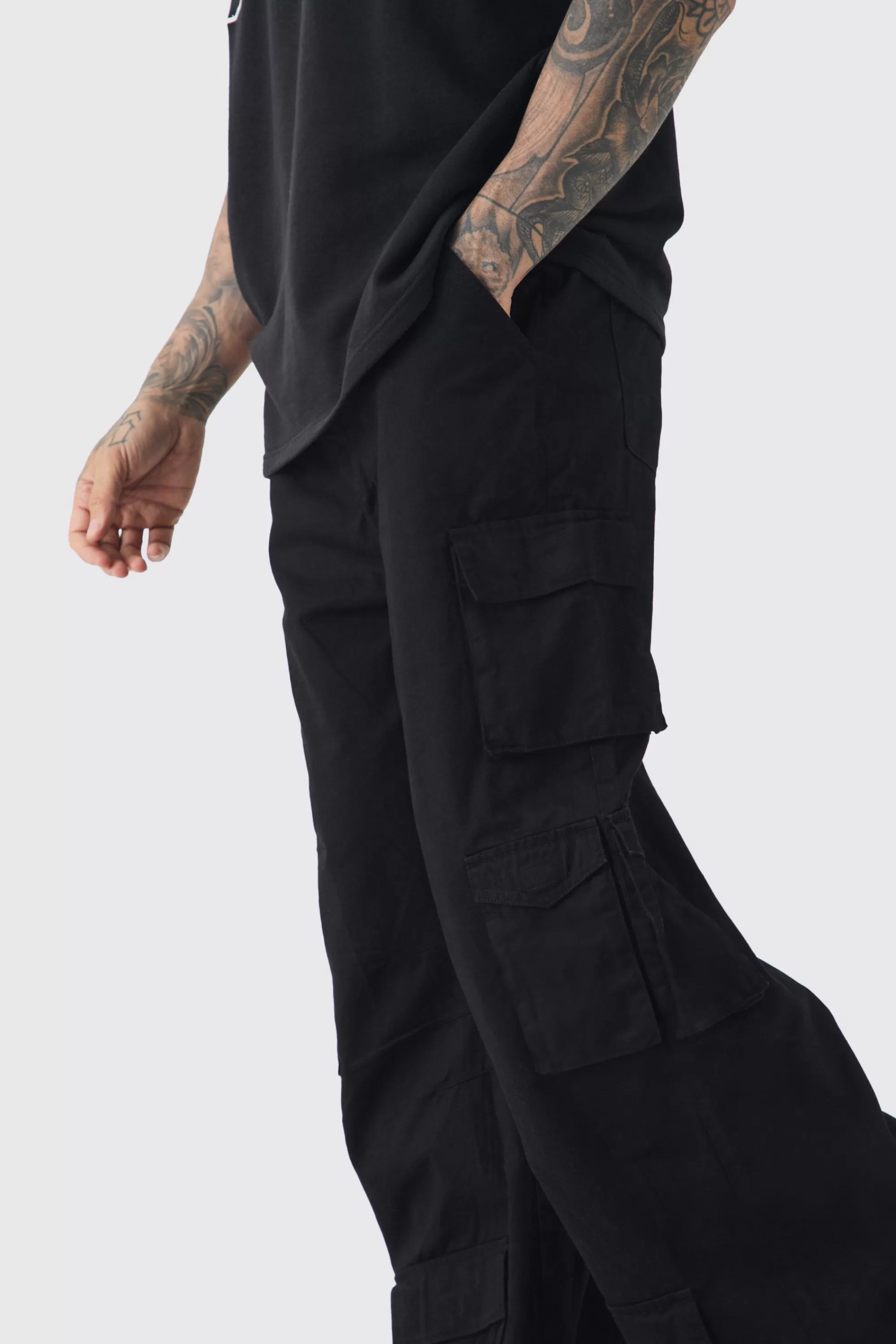 boohooMAN Tall Extreme Baggy Rigid Multi Cargo Pocket Trousers | UK