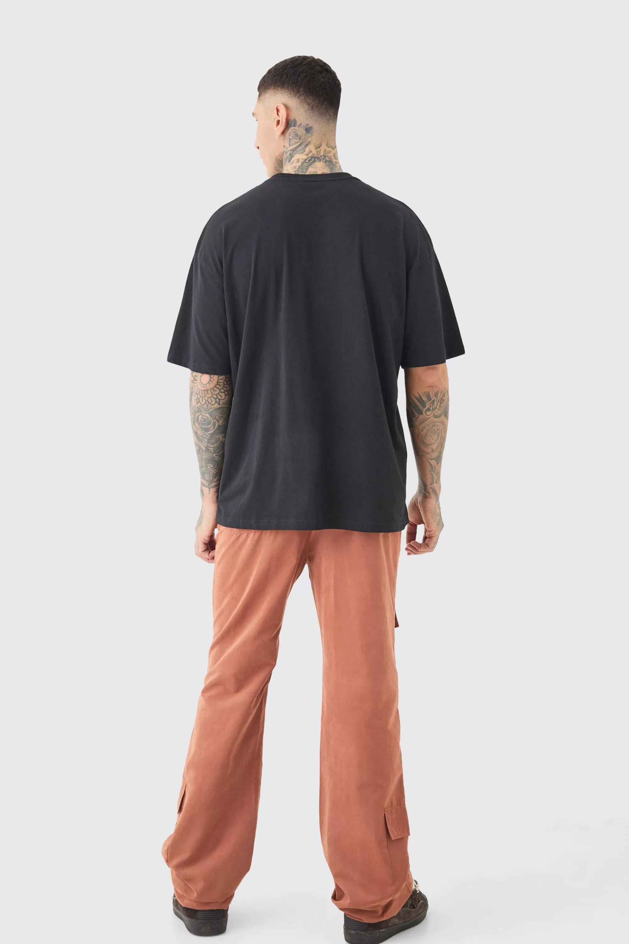 boohooMAN Tall Fixed Waist Relaxed Peached Flare Cargo Trouser | UK