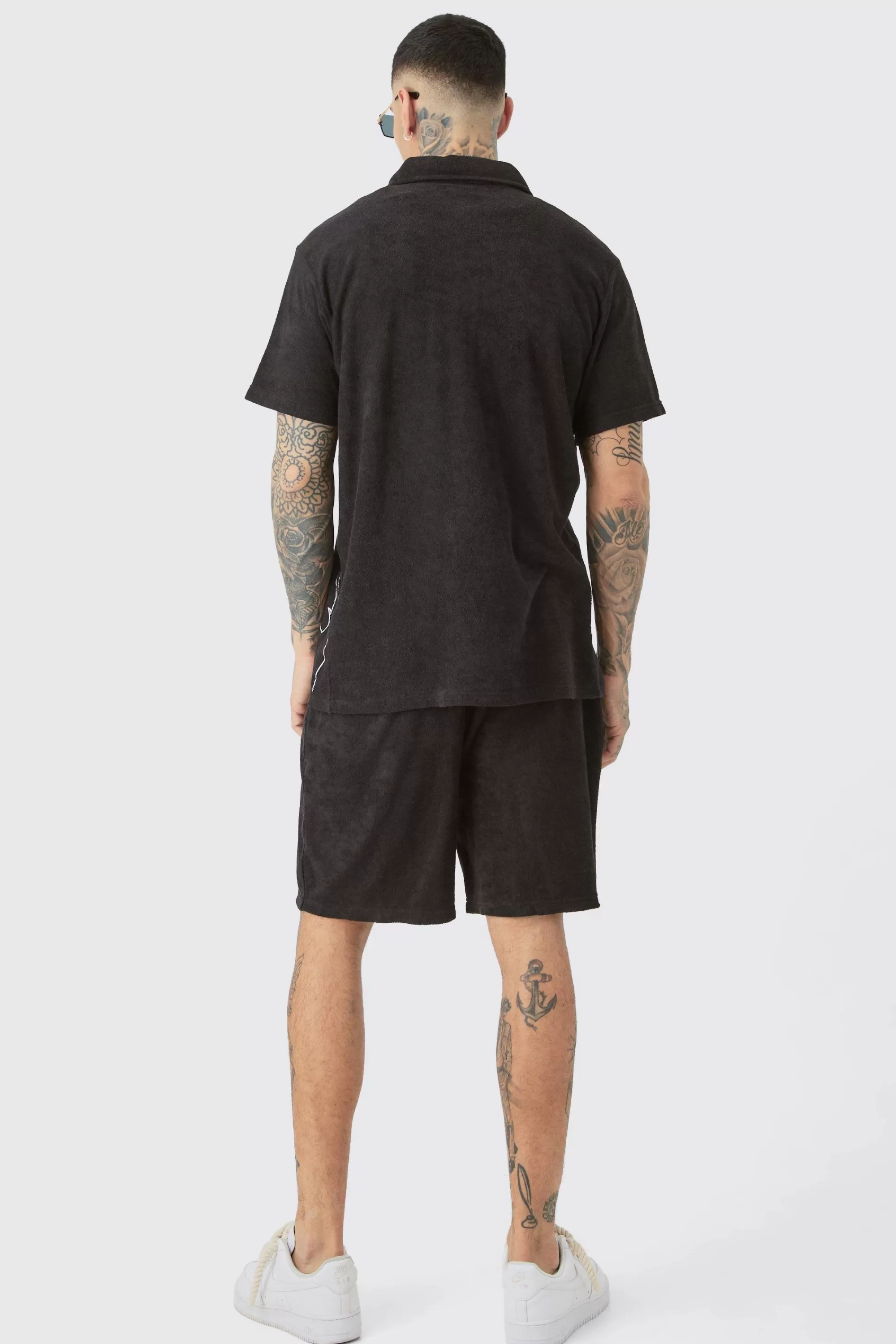 boohooMAN Tall Flame Embroidered Towelling Shirt & Short Set | UK