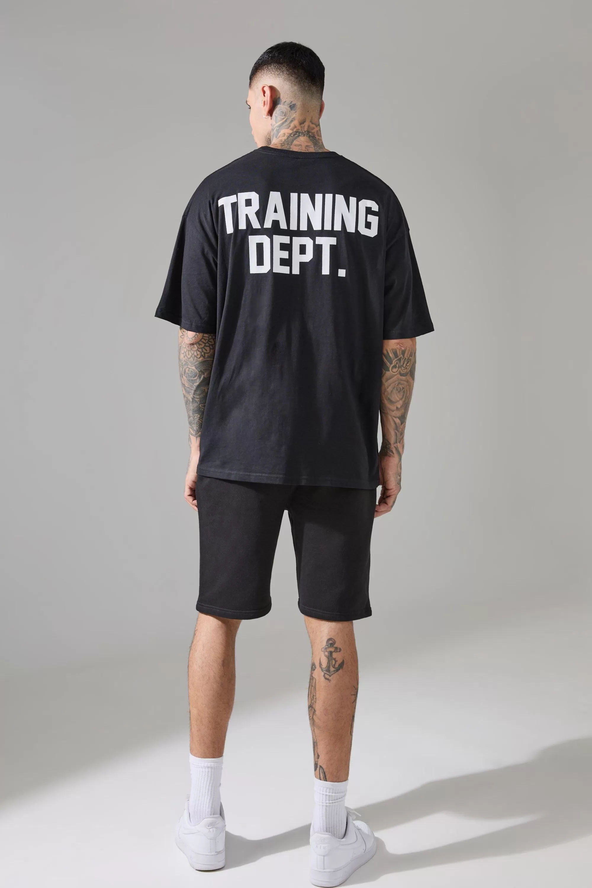 boohooMAN Tall Man Active Training Dept. Oversized T-shirt And Short Set | UK