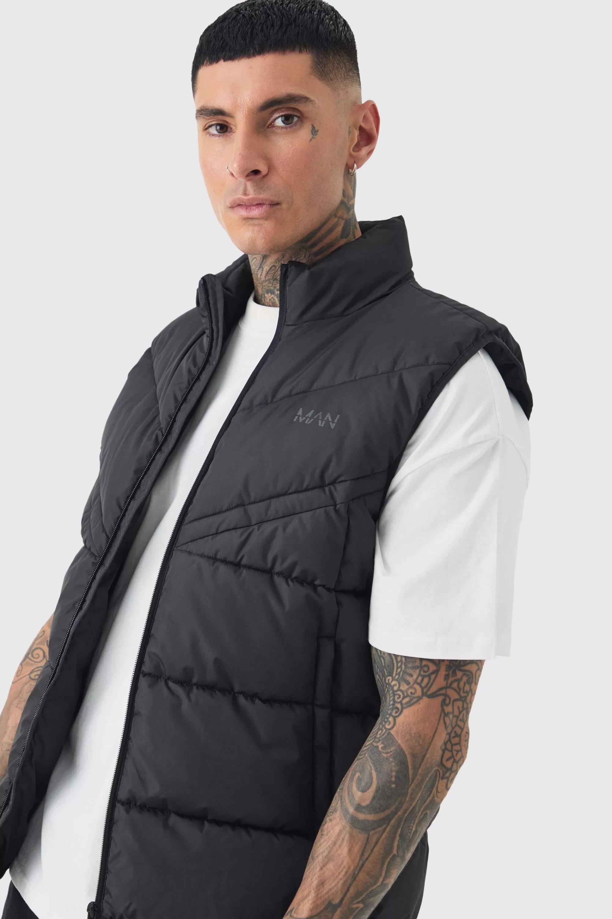 boohooMAN Tall Man Dash Quilted Funnel Neck Gilet | UK
