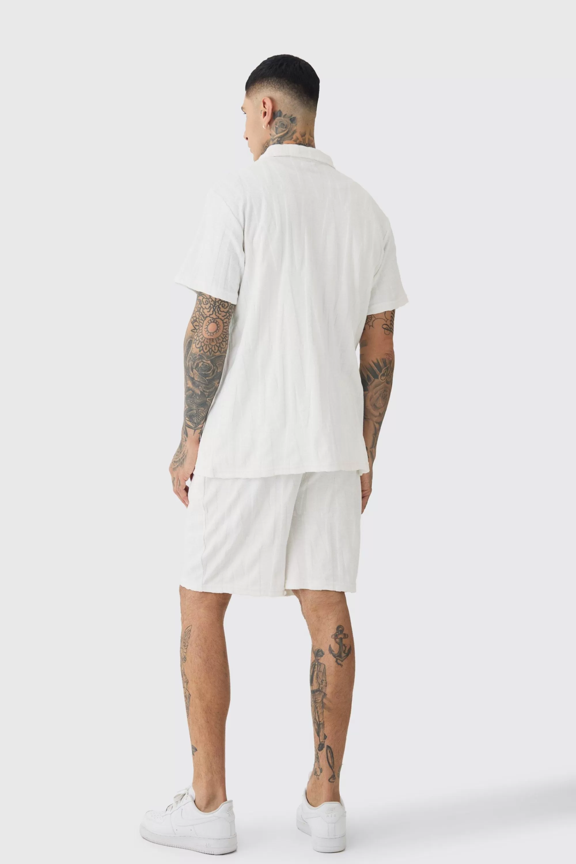 boohooMAN Tall Man Embossed Towelling Shirt & Short Set | UK