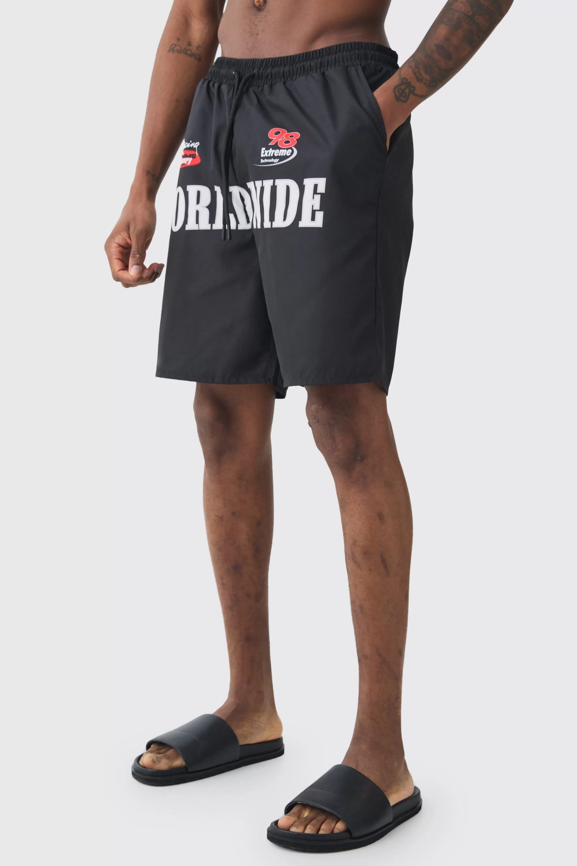 boohooMAN Tall Moto Printed Swim Shorts | UK