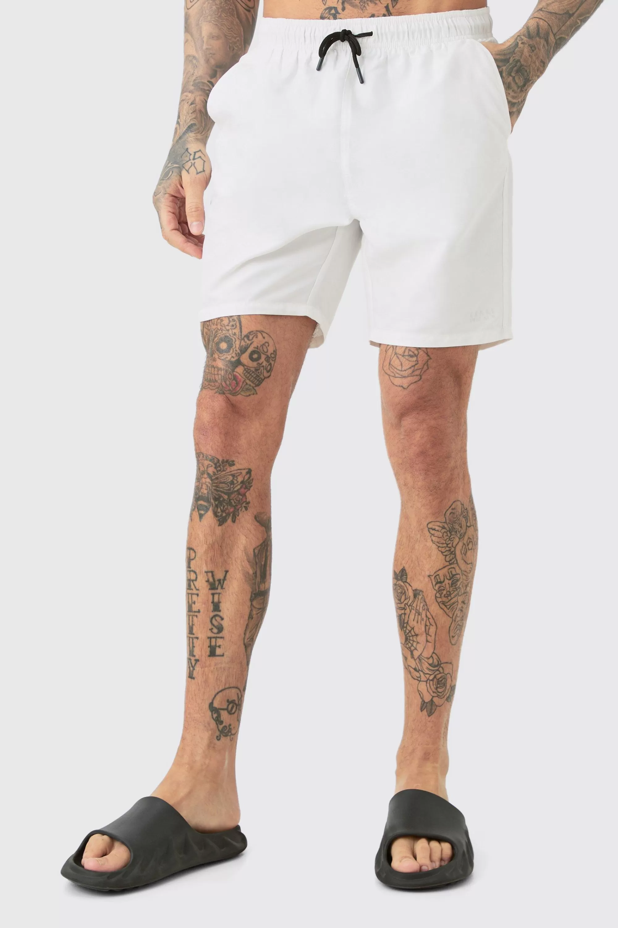 boohooMAN Tall Original Man Mid Length Swim Short | UK