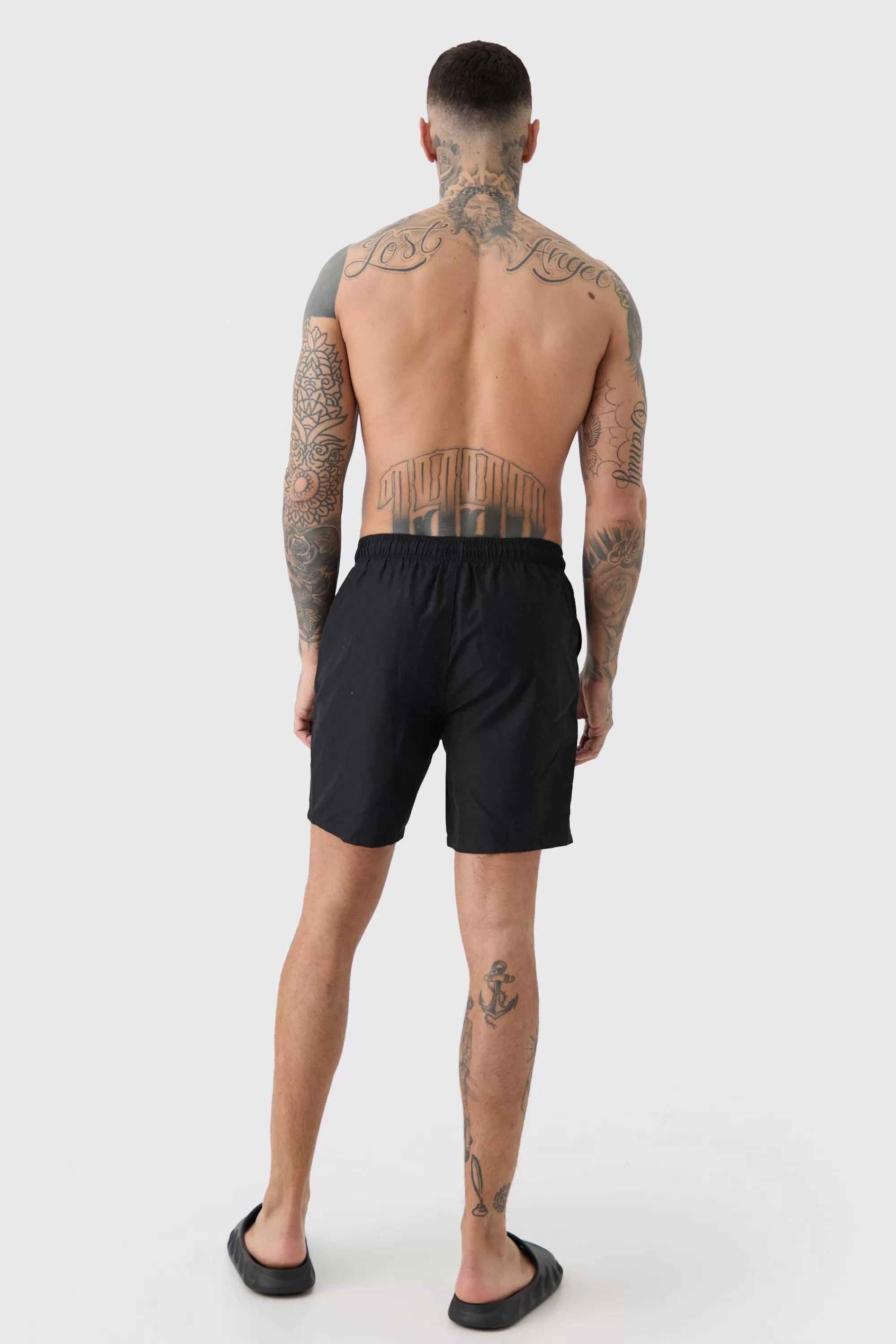 boohooMAN Tall Original Man Mid Length Swim Short | UK