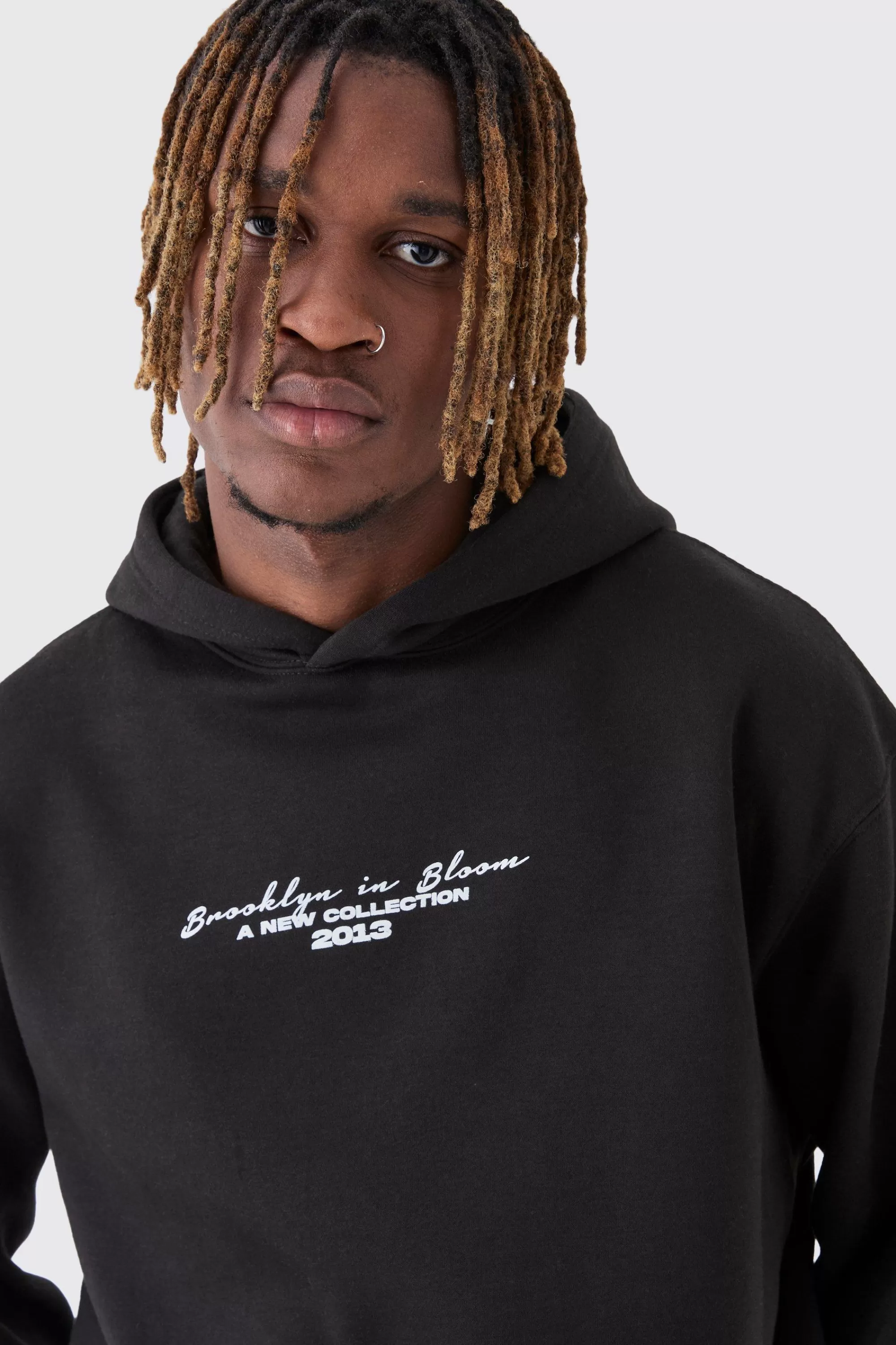 boohooMAN Tall Overdyed Spliced Floral Graphic Oversized Hoodie | UK