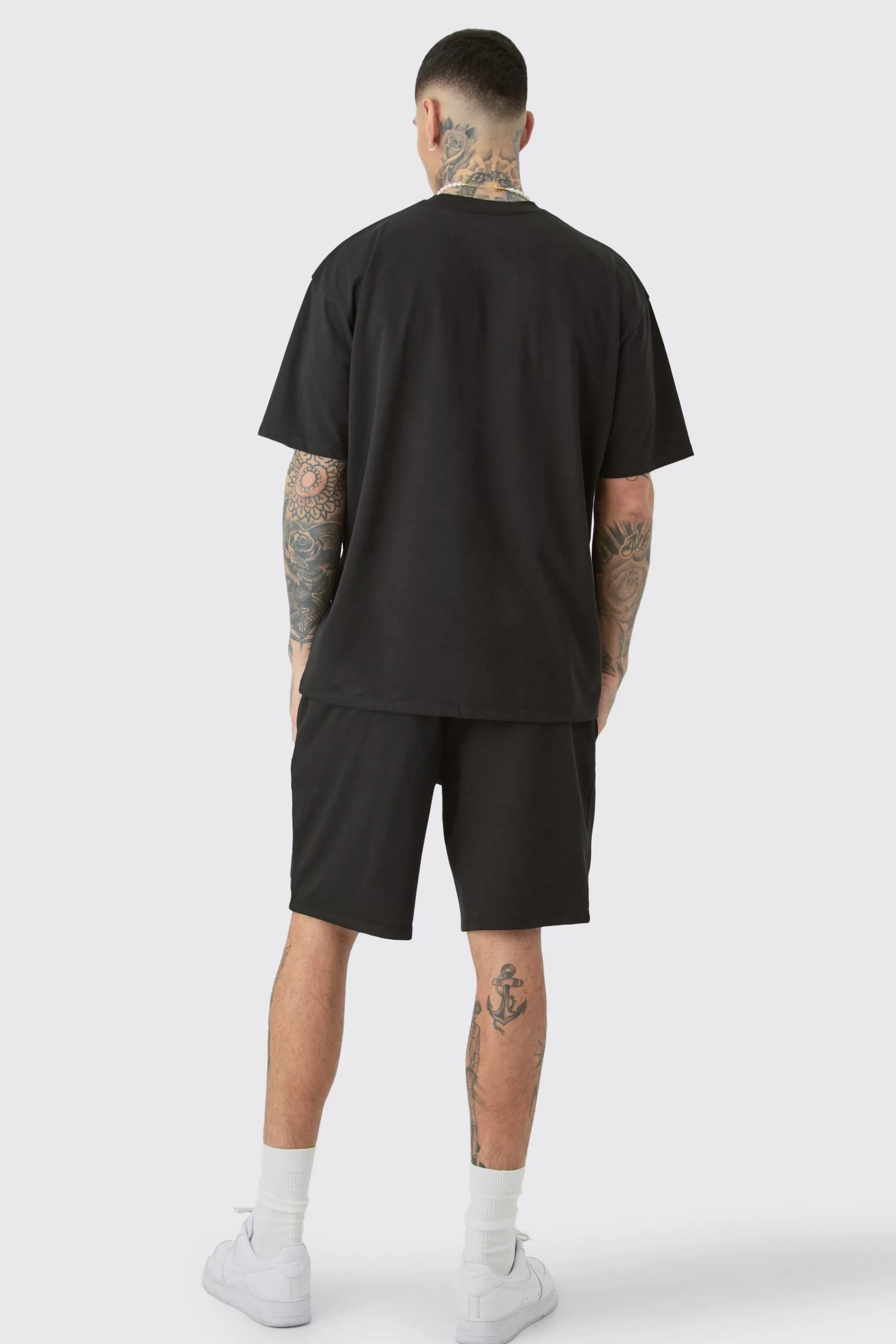 boohooMAN Tall Oversized Applique T-shirt & Short Set | UK