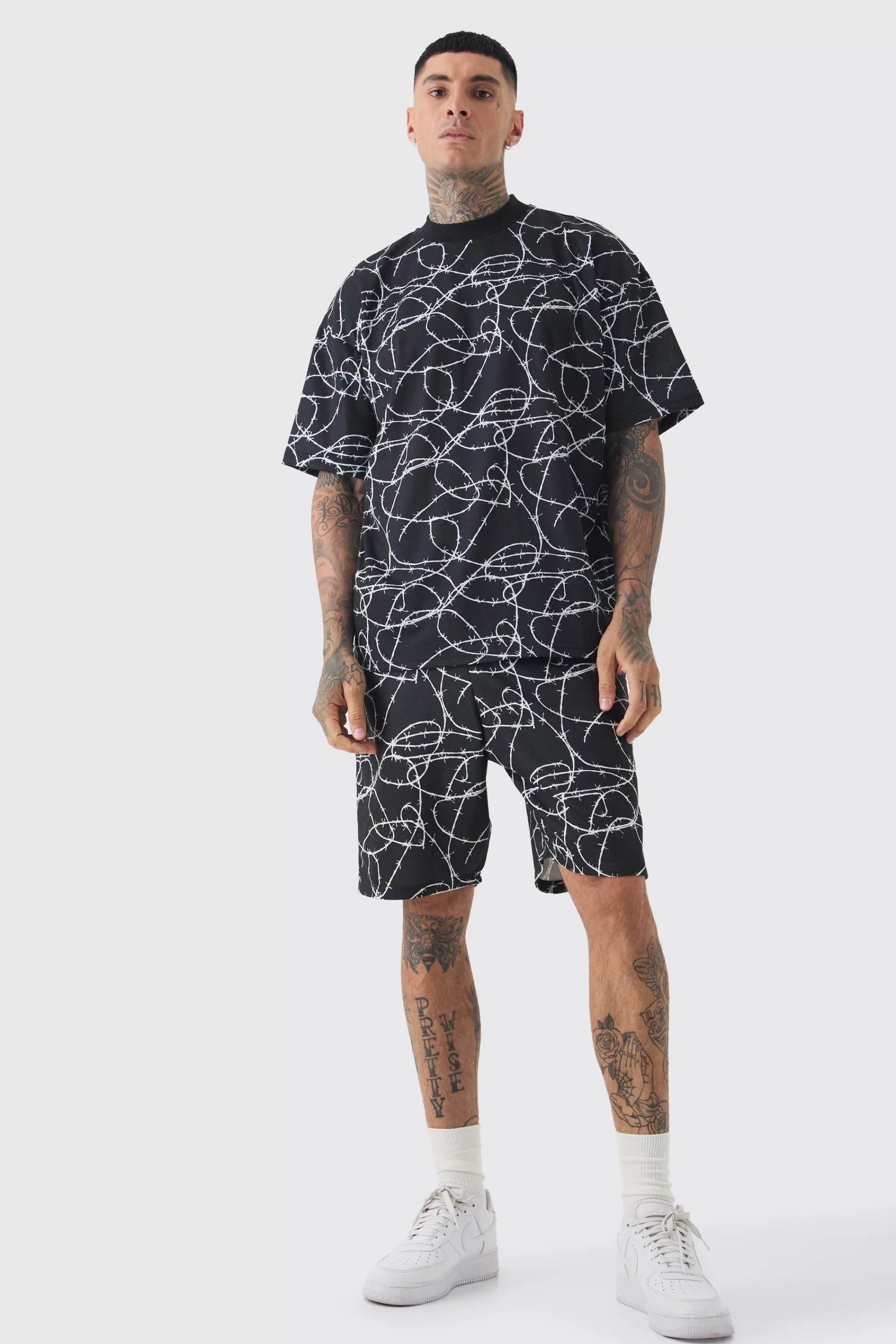 boohooMAN Tall Oversized Extended Neck Barbwire T-shirt & Short Set | UK