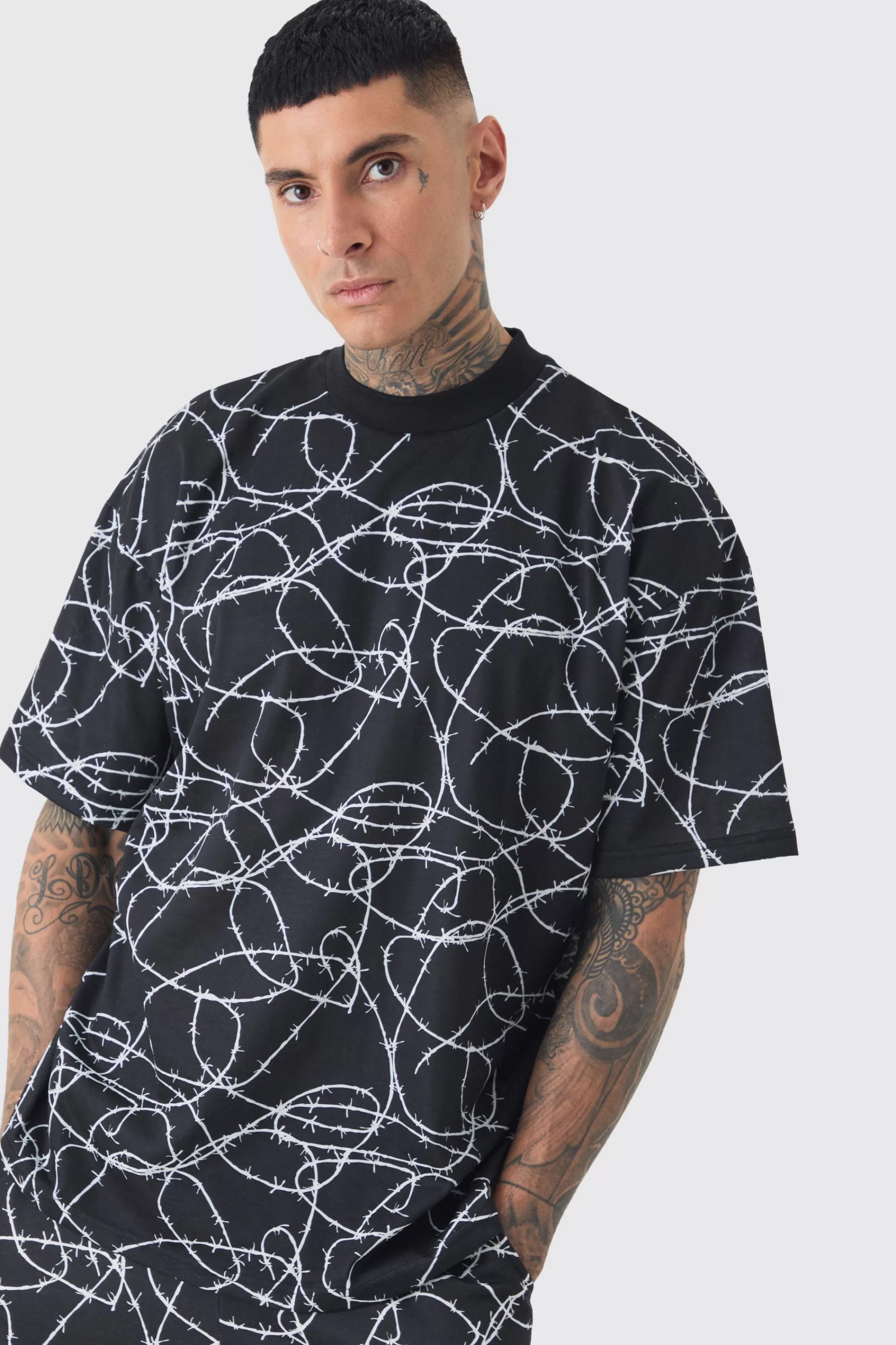 boohooMAN Tall Oversized Extended Neck Barbwire T-shirt & Short Set | UK