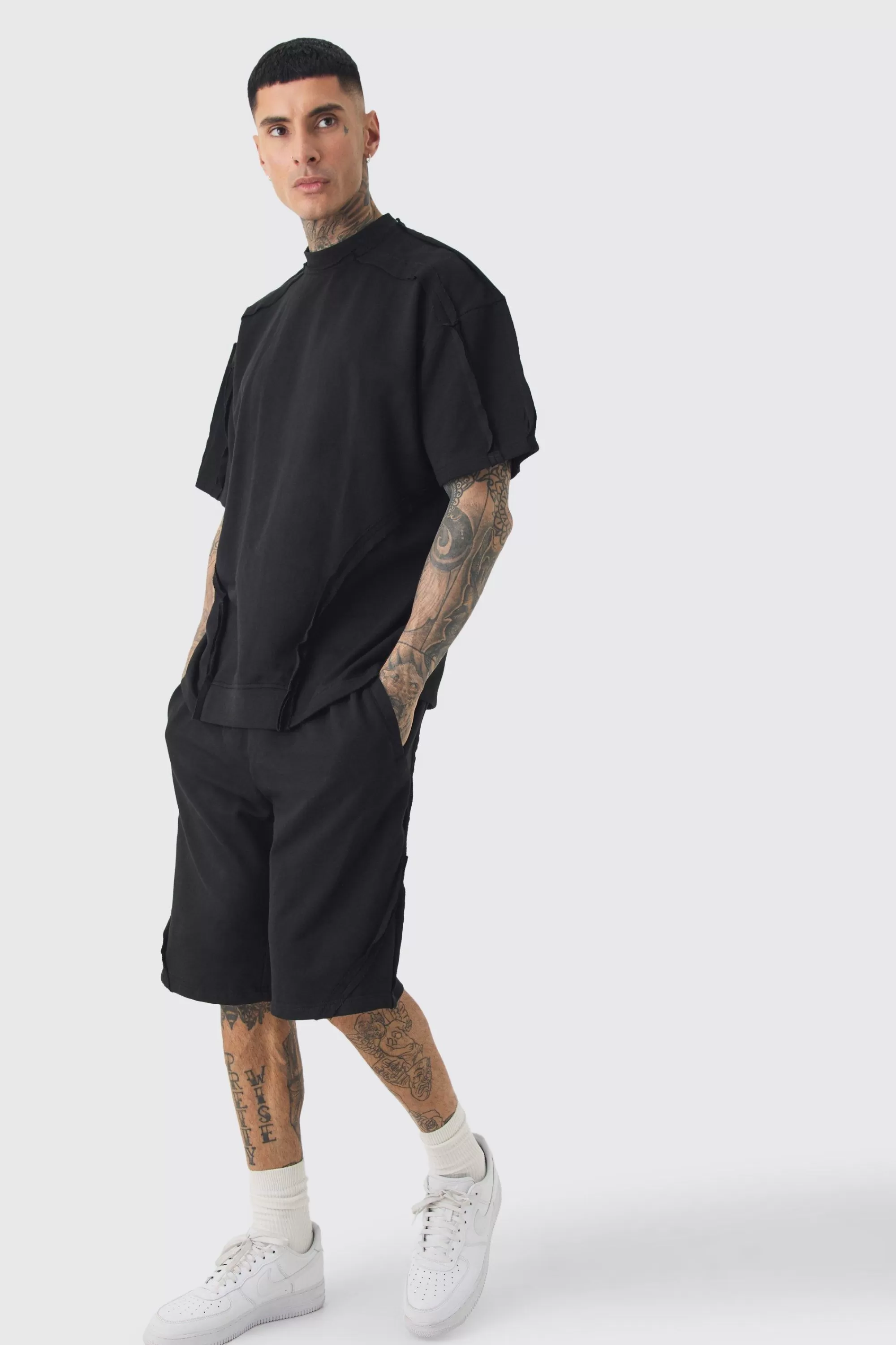 boohooMAN Tall Oversized Extended Neck Exposed Seam T-shirt & Short Set | UK