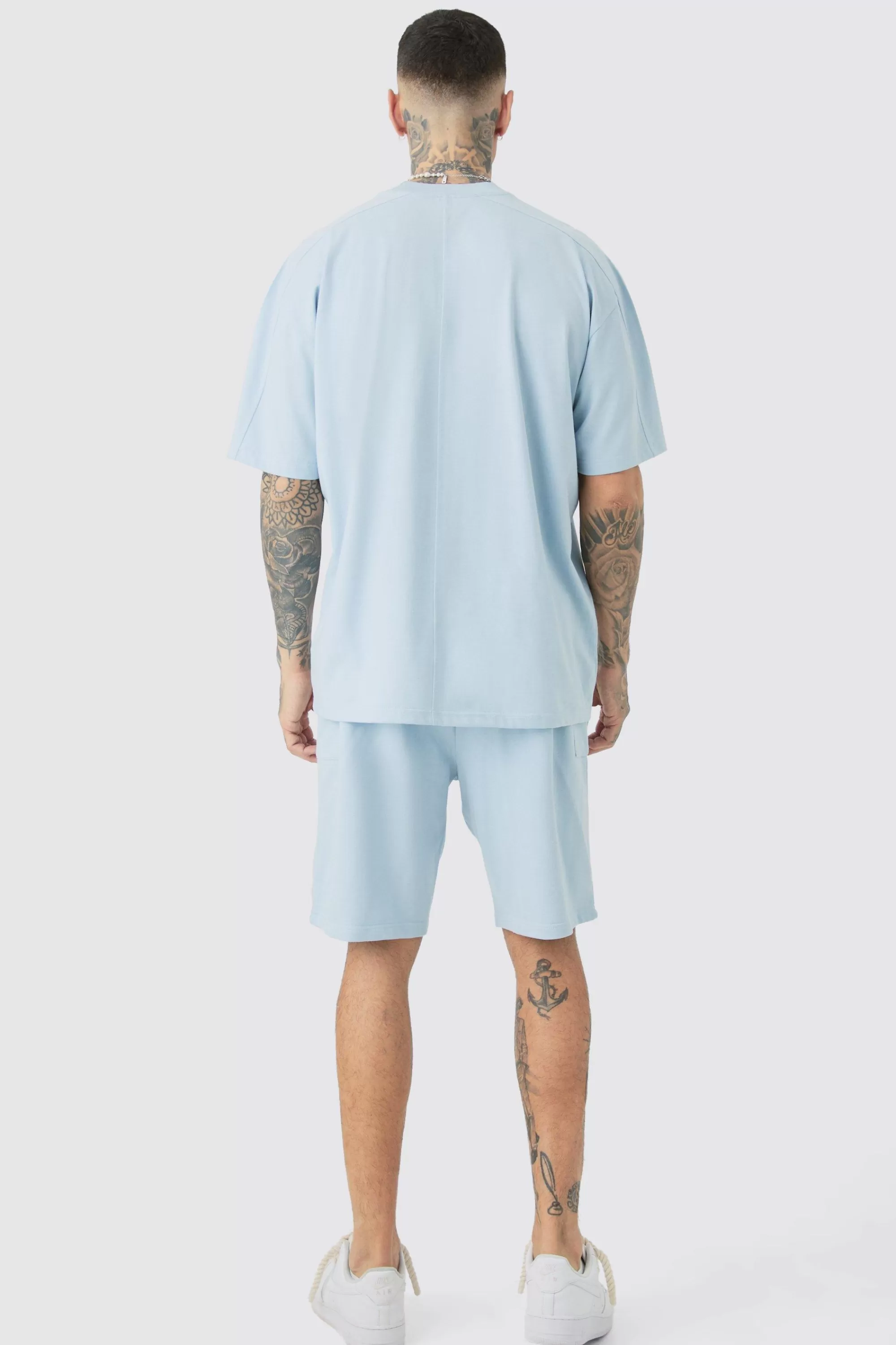 boohooMAN Tall Oversized Extended Neck Panel T-shirt & Cargo Short Set | UK