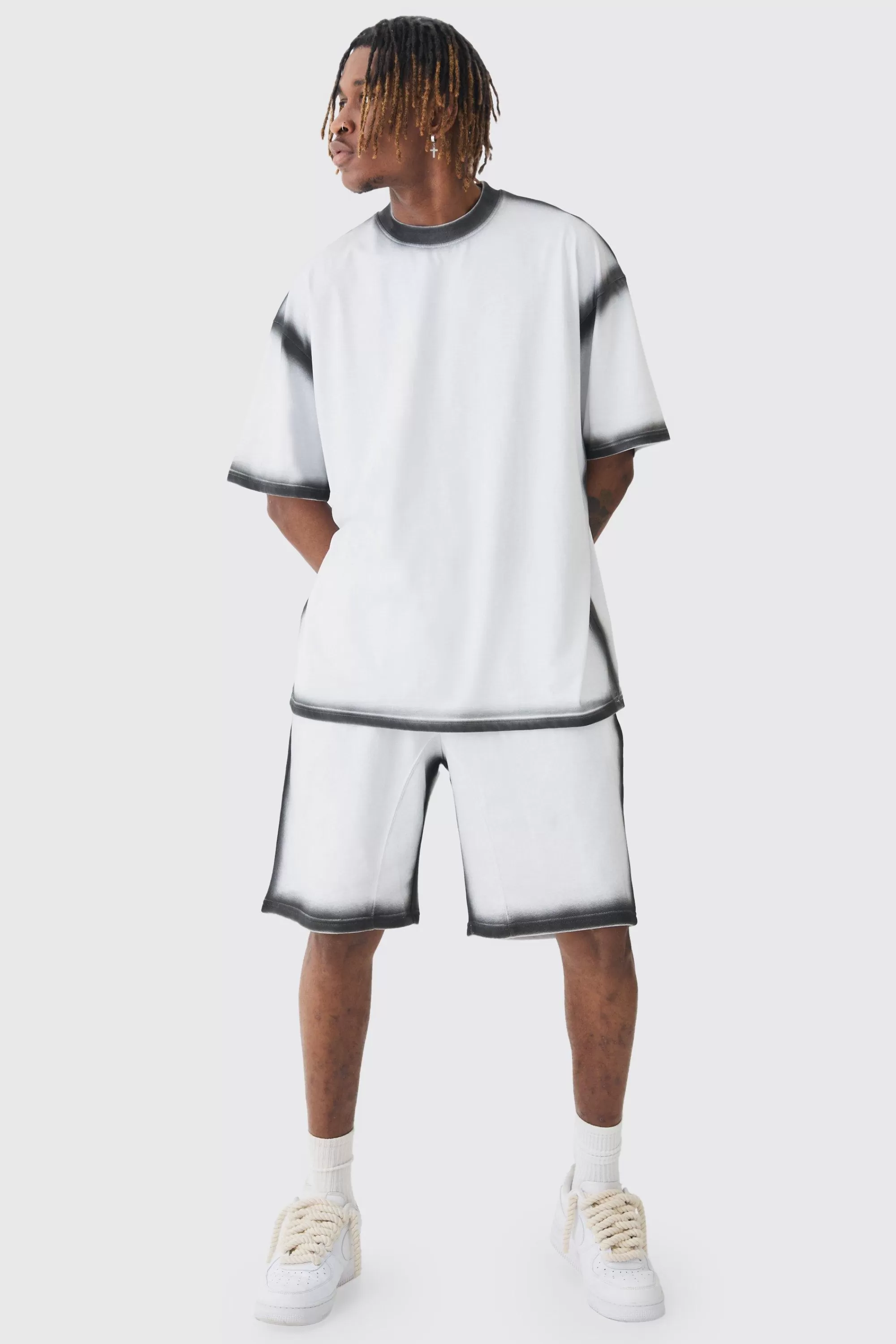 boohooMAN Tall Oversized Extended Neck Spray Wash T-shirt & Short Set | UK