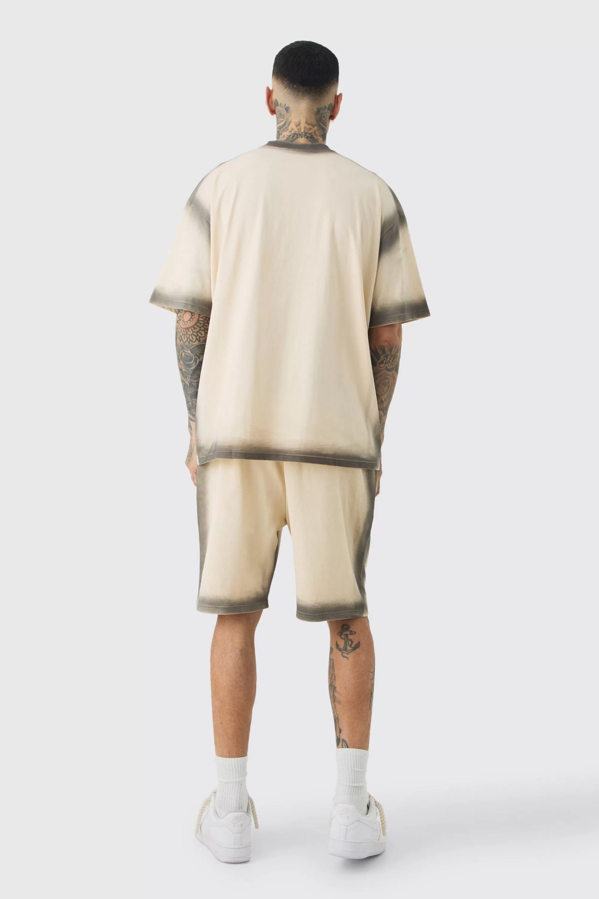 boohooMAN Tall Oversized Extended Neck Spray Wash T-shirt & Short Set | UK