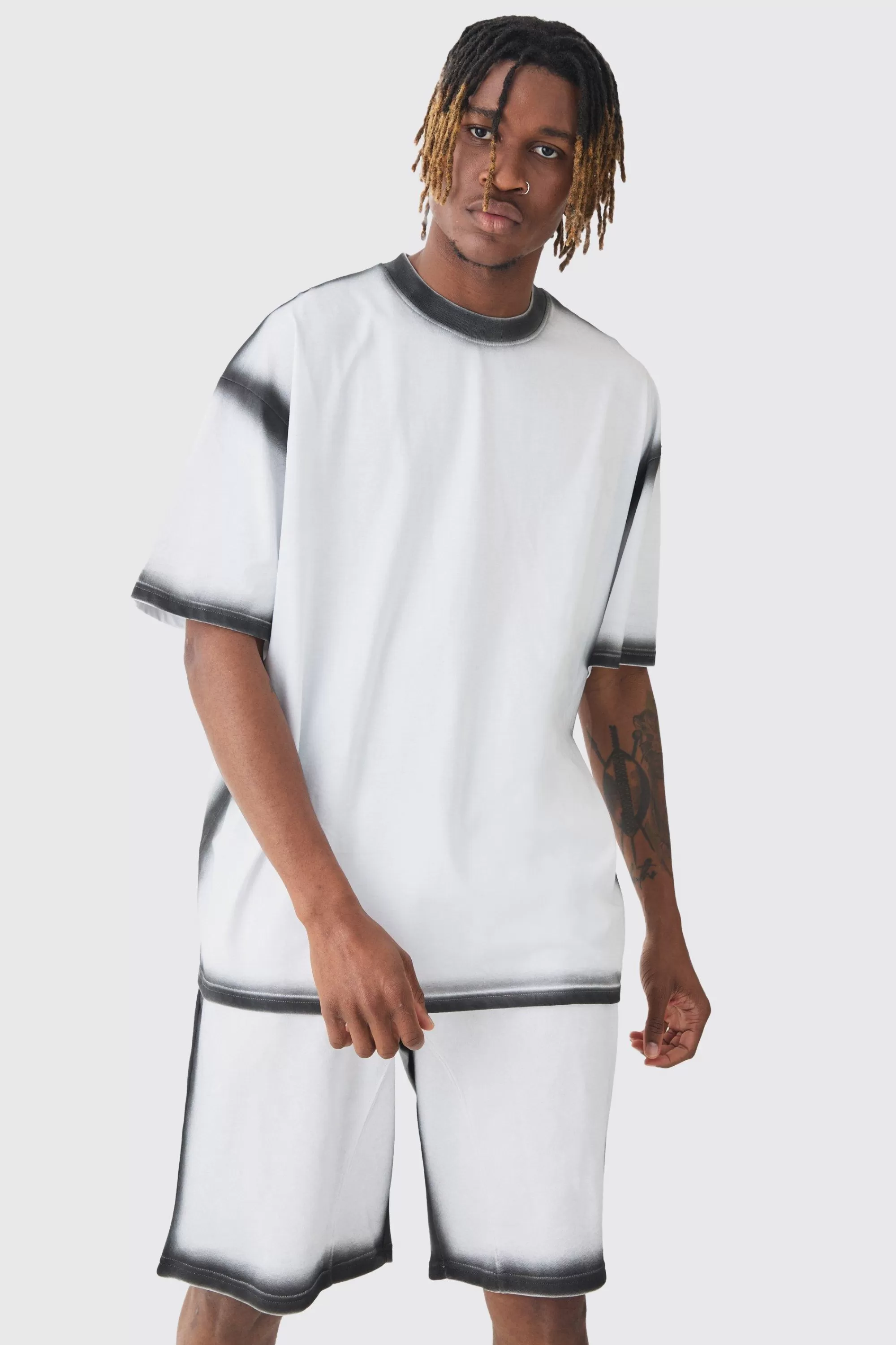 boohooMAN Tall Oversized Extended Neck Spray Wash T-shirt & Short Set | UK