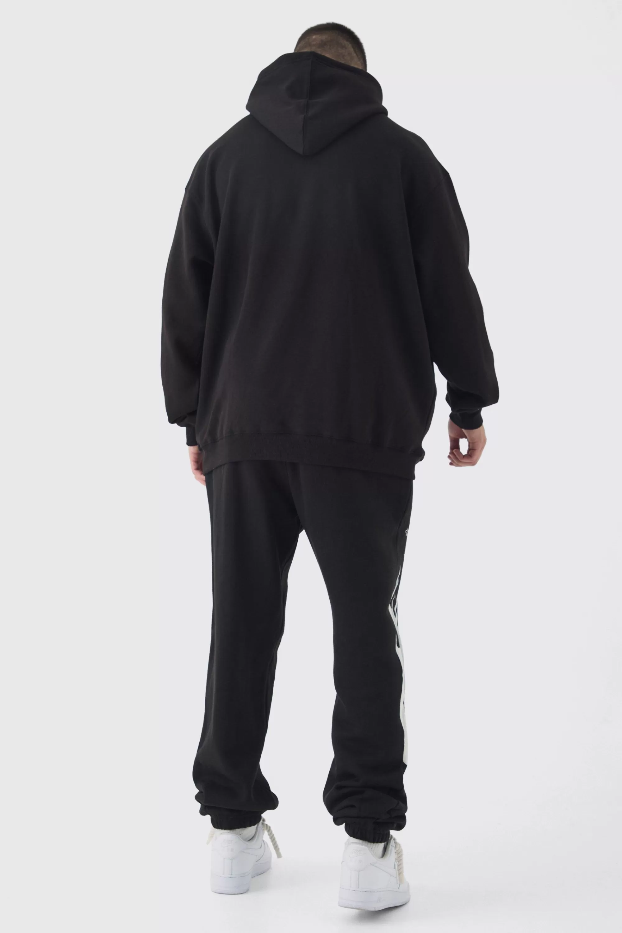 boohooMAN Tall Pour Homme Cross Print Oversized Tracksuit In | UK