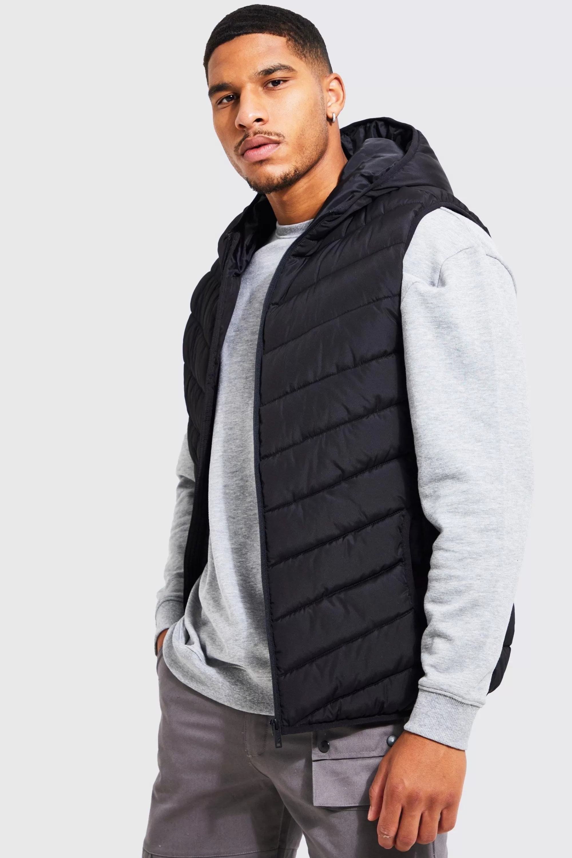 boohooMAN Tall Quilted Zip Through Gilet | UK