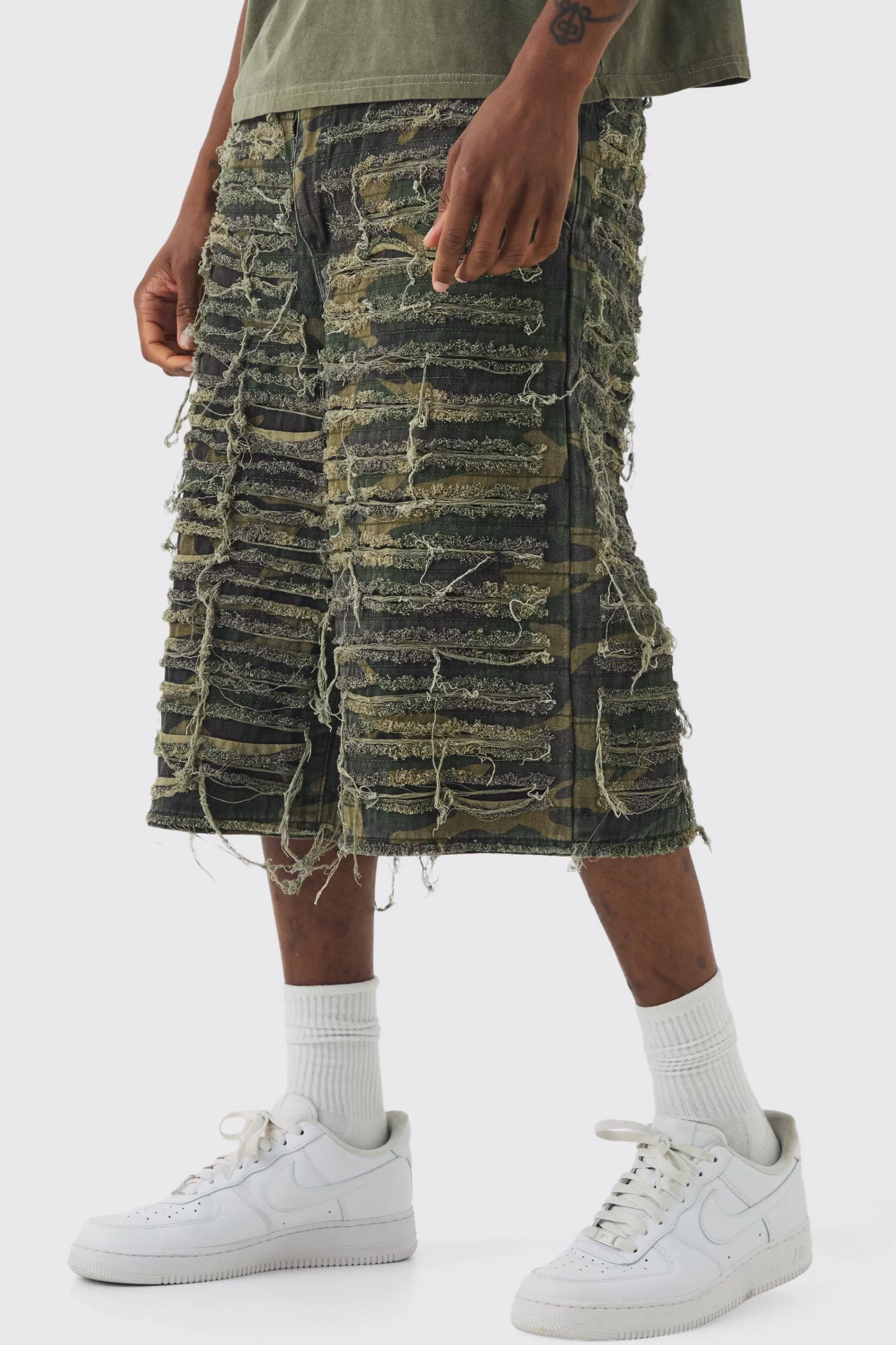 boohooMAN Tall Relaxed Heavily Distressed Camo Jort | UK