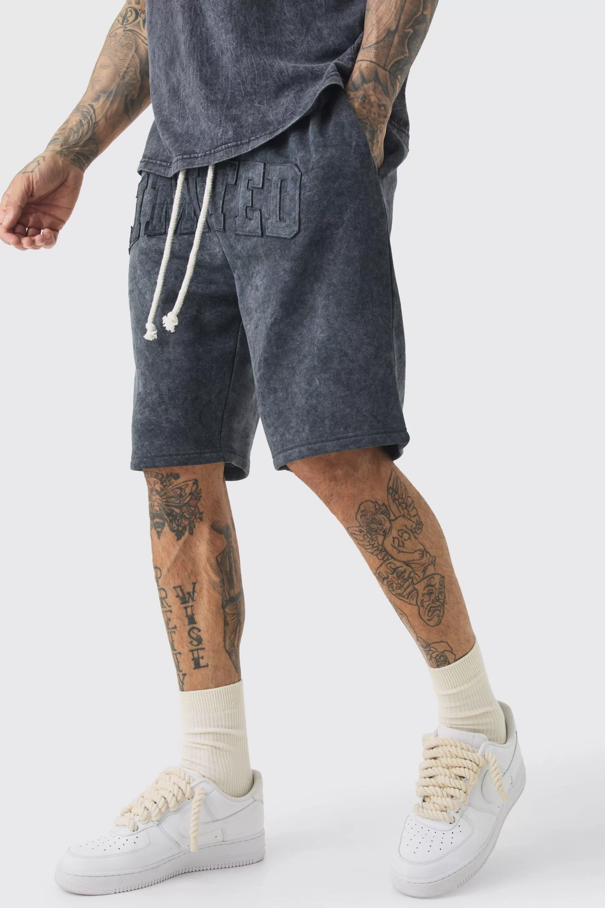 boohooMAN Tall Relaxed Limited Applique Washed Jersey Shorts | UK