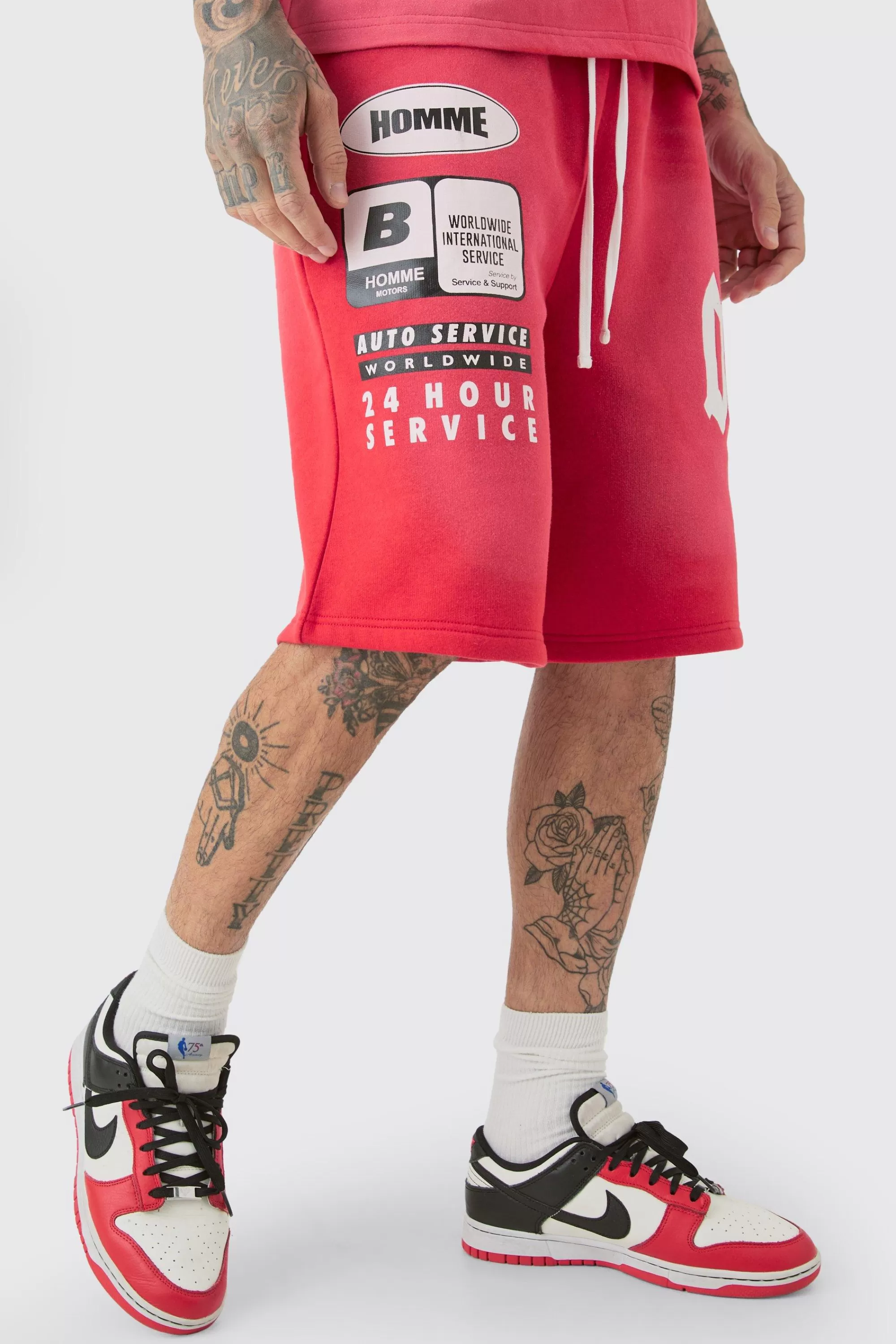 boohooMAN Tall Relaxed Washed Applique Moto Jersey Shorts | UK
