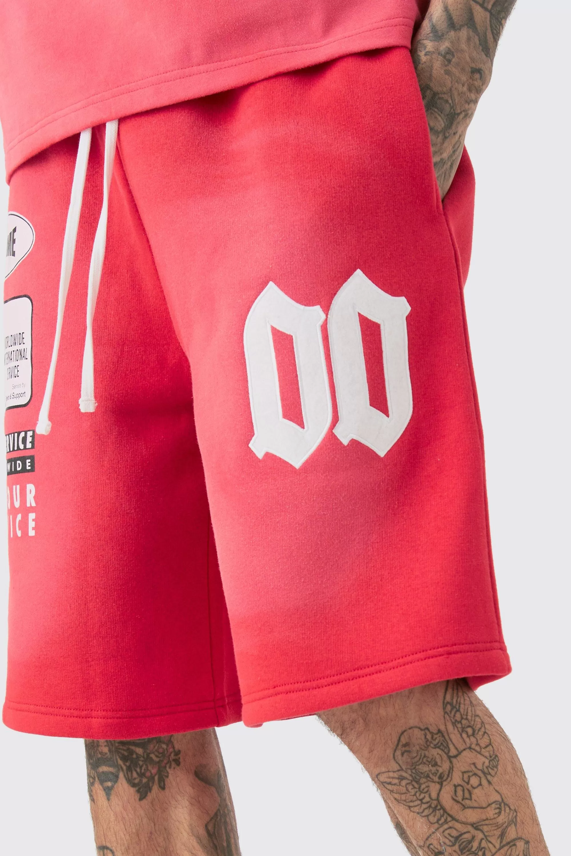 boohooMAN Tall Relaxed Washed Applique Moto Jersey Shorts | UK