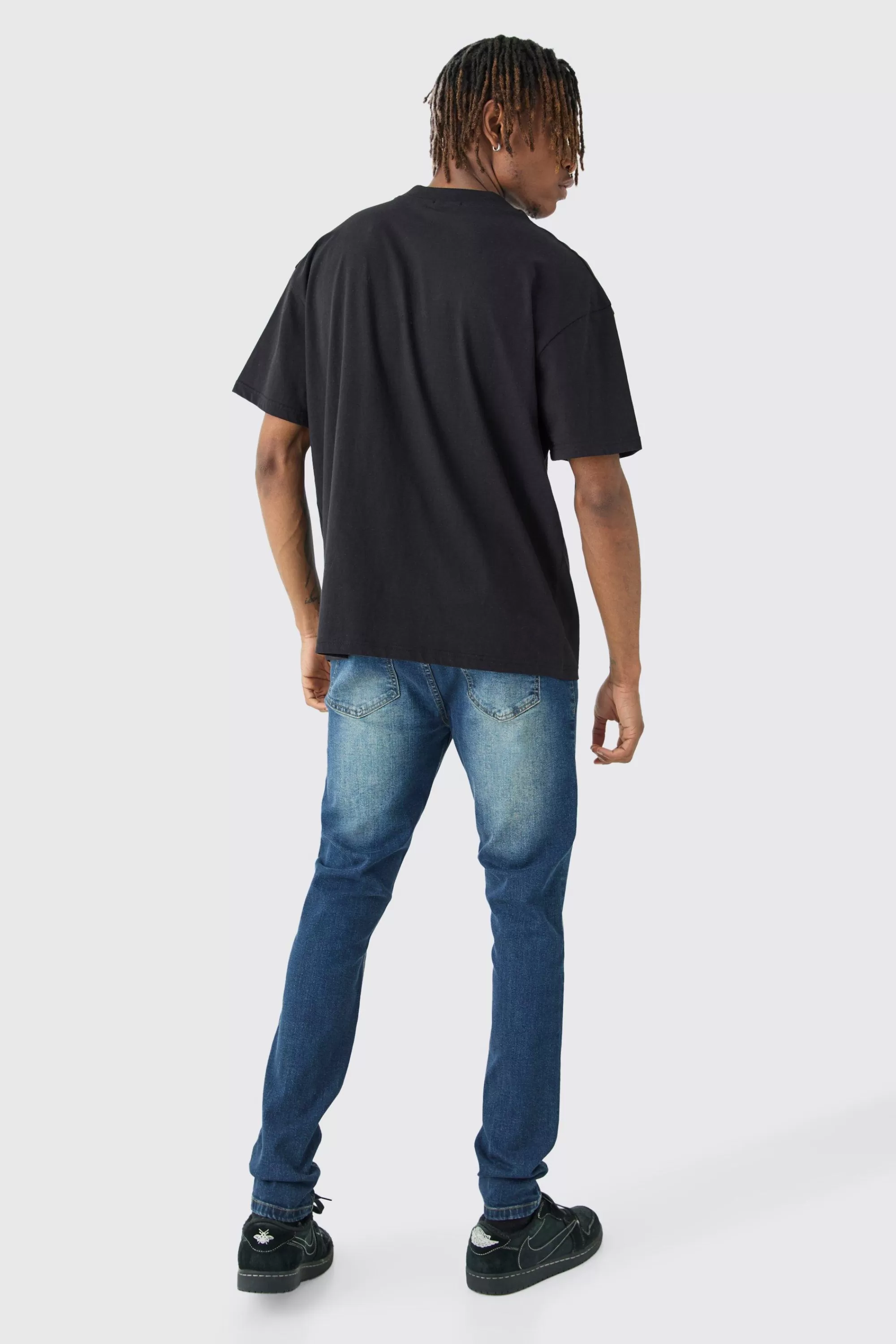 boohooMAN Tall Skinny Stretch Jean In Antique Blue | UK