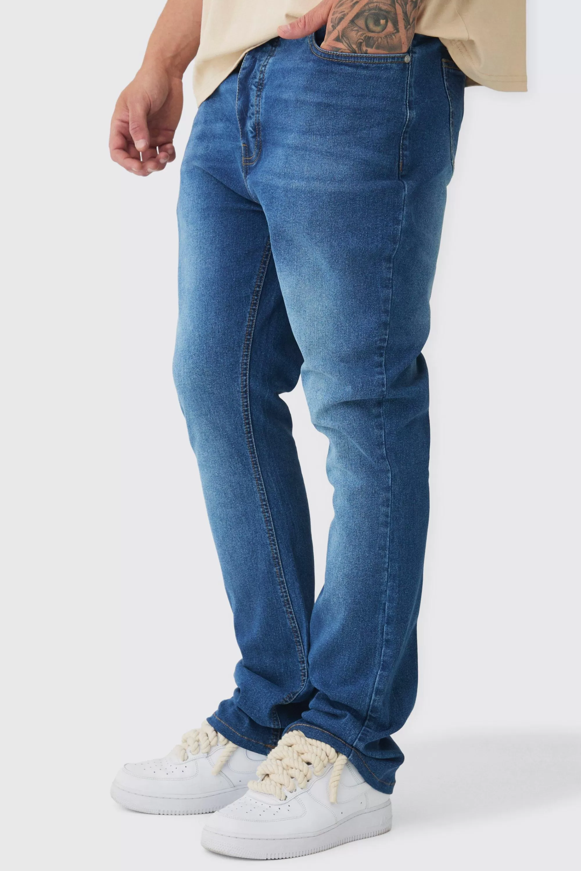 boohooMAN Tall Stretch Denim Flared Jeans | UK