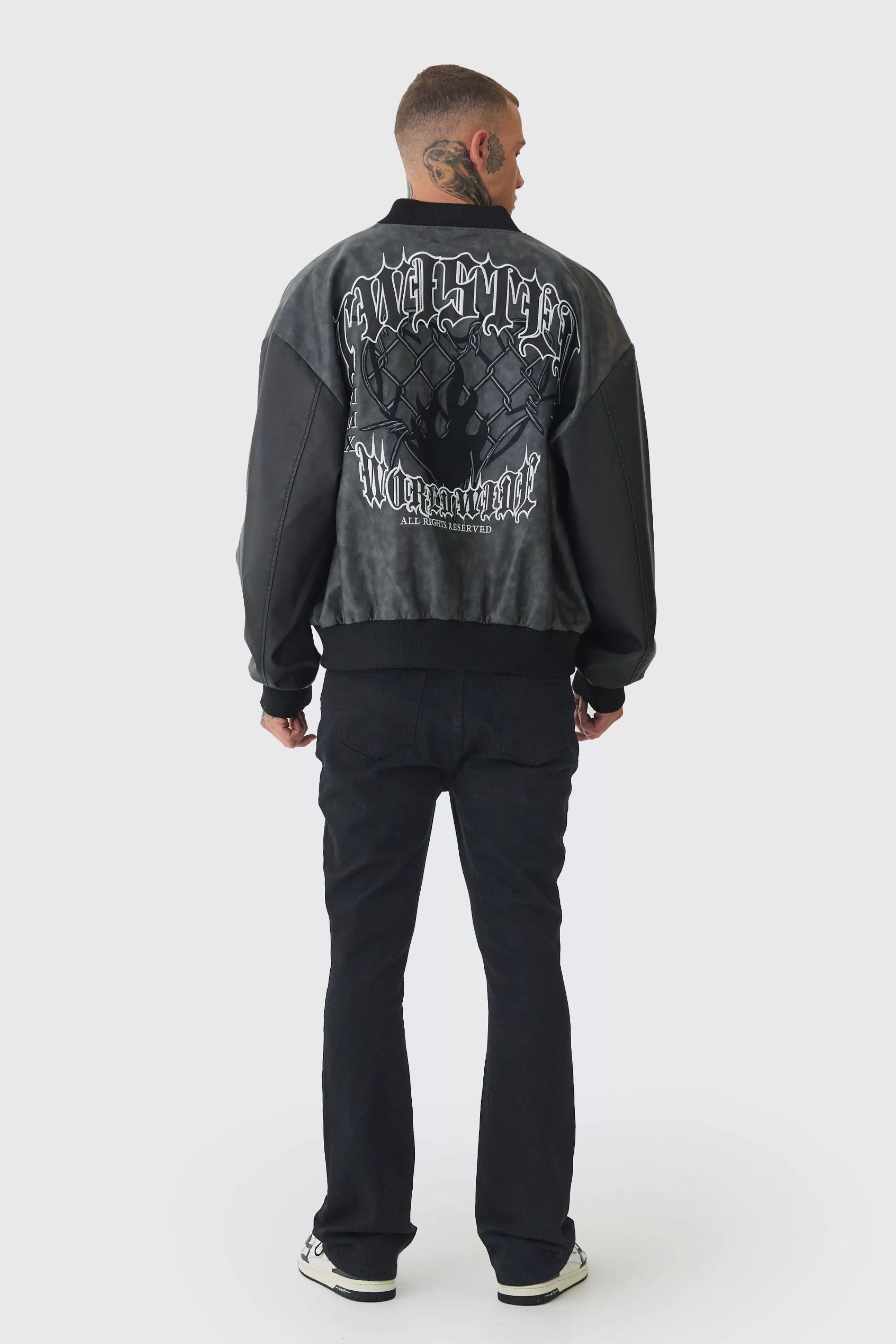 boohooMAN Tall Stretch Denim Flared Jeans | UK