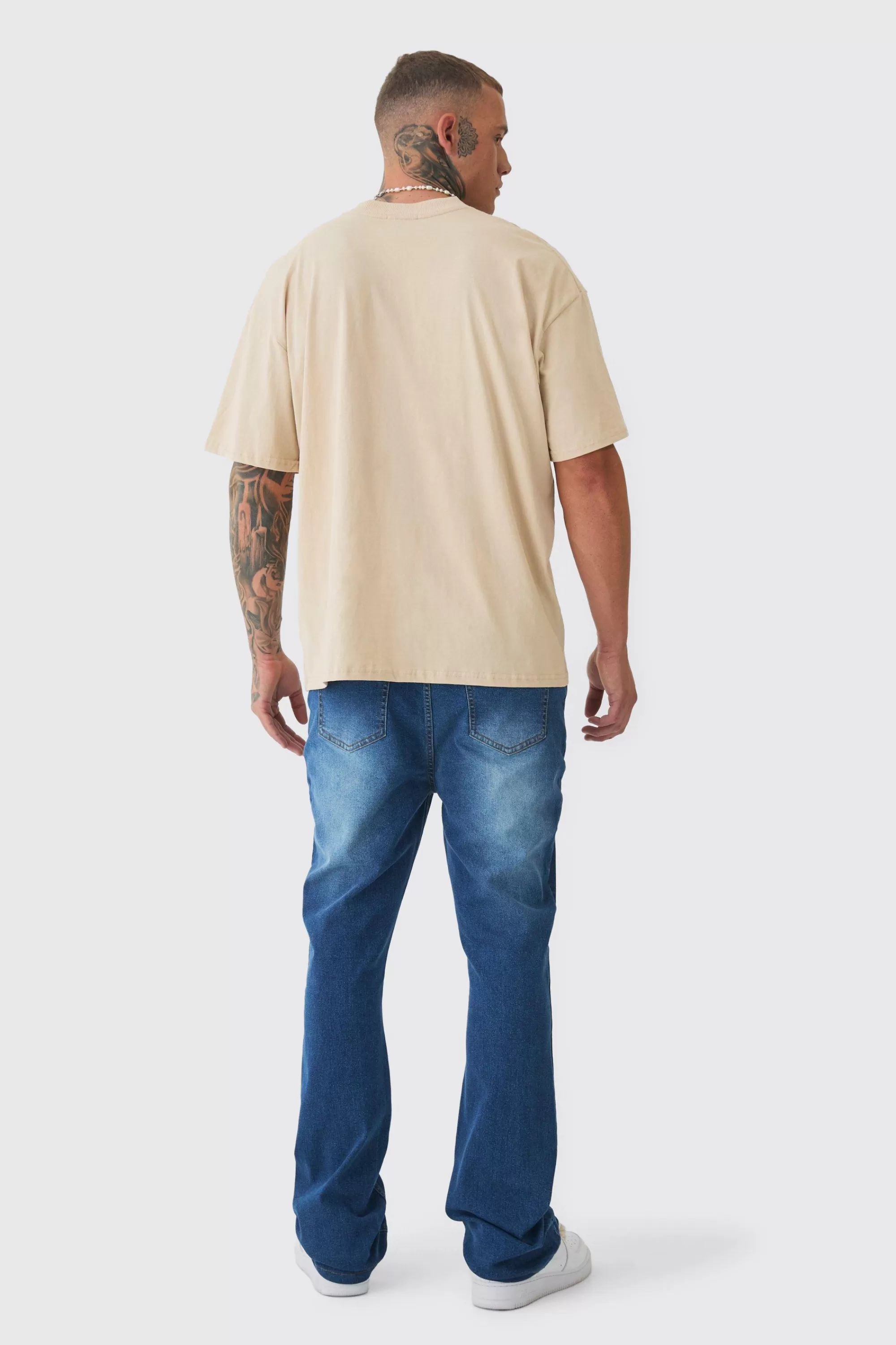 boohooMAN Tall Stretch Denim Flared Jeans | UK